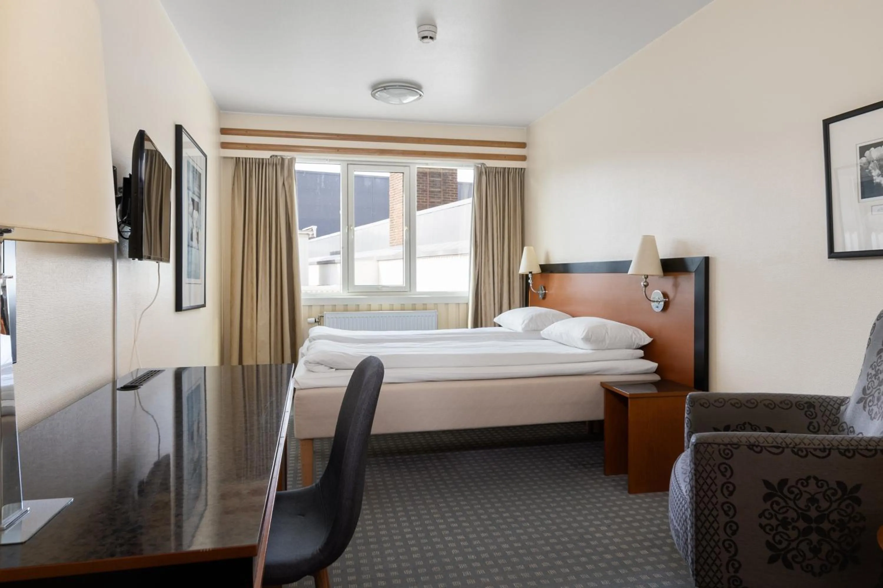 Bed in Frichs Hotel Hamar