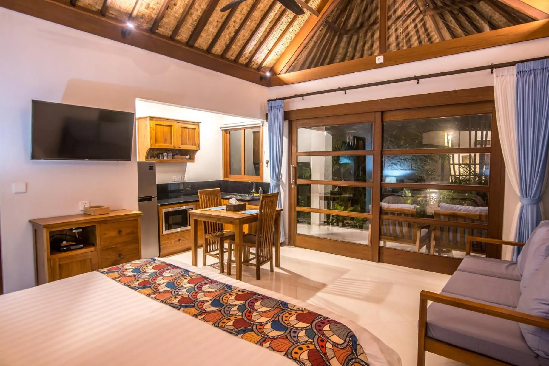 Seating area, Bed in Bali Santi Bungalows