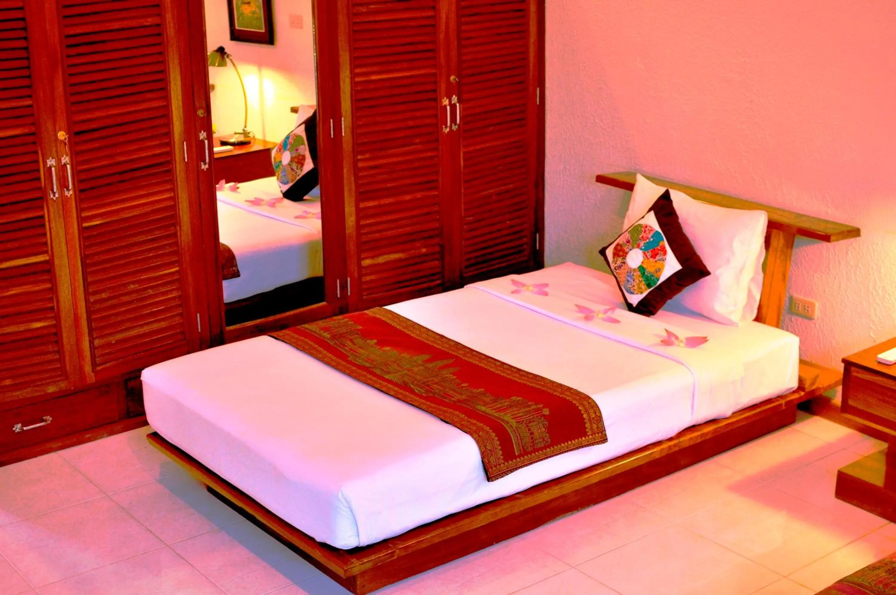 Bed in Memoria Palace & Resort