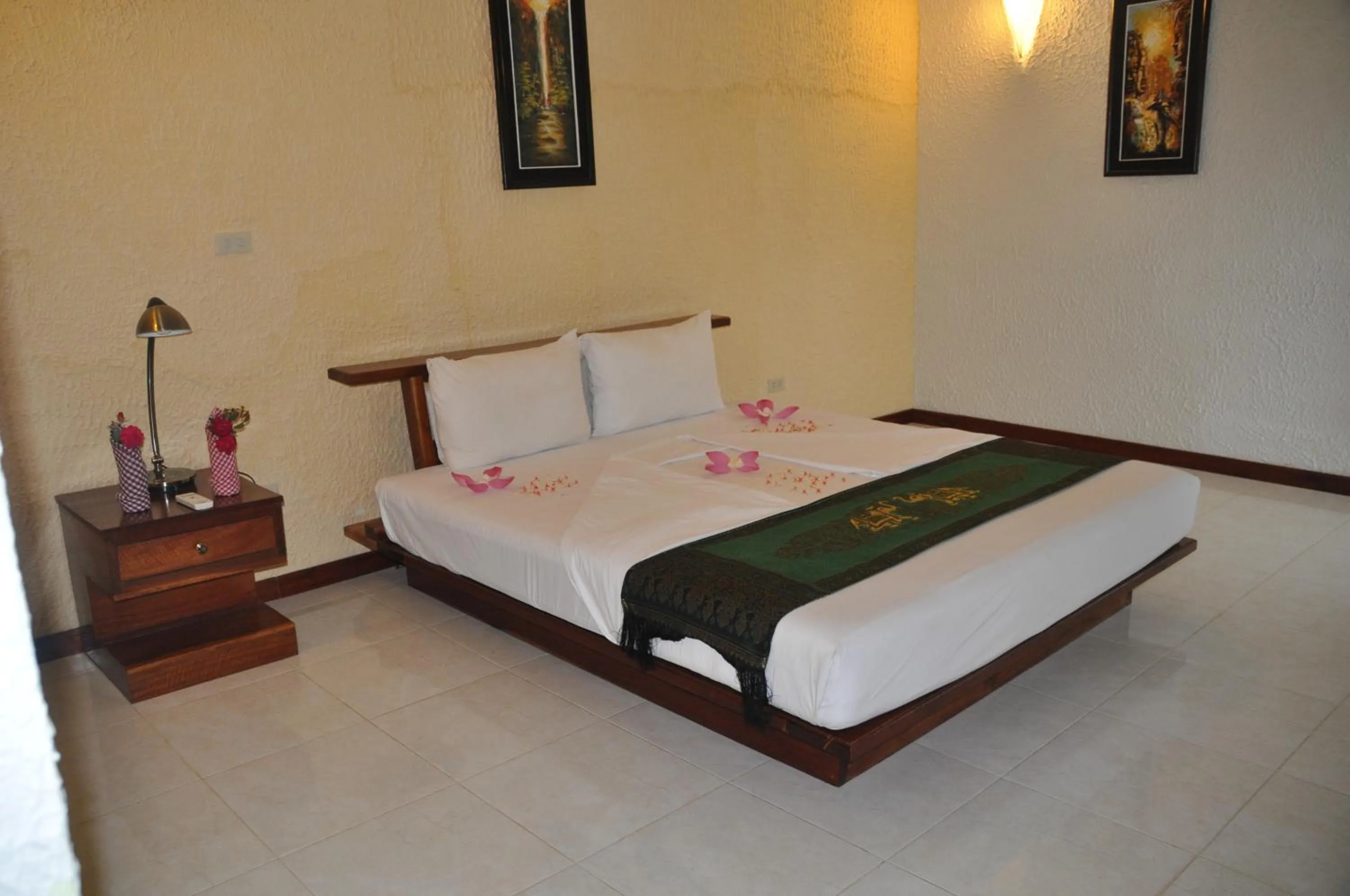Bed in Memoria Palace & Resort