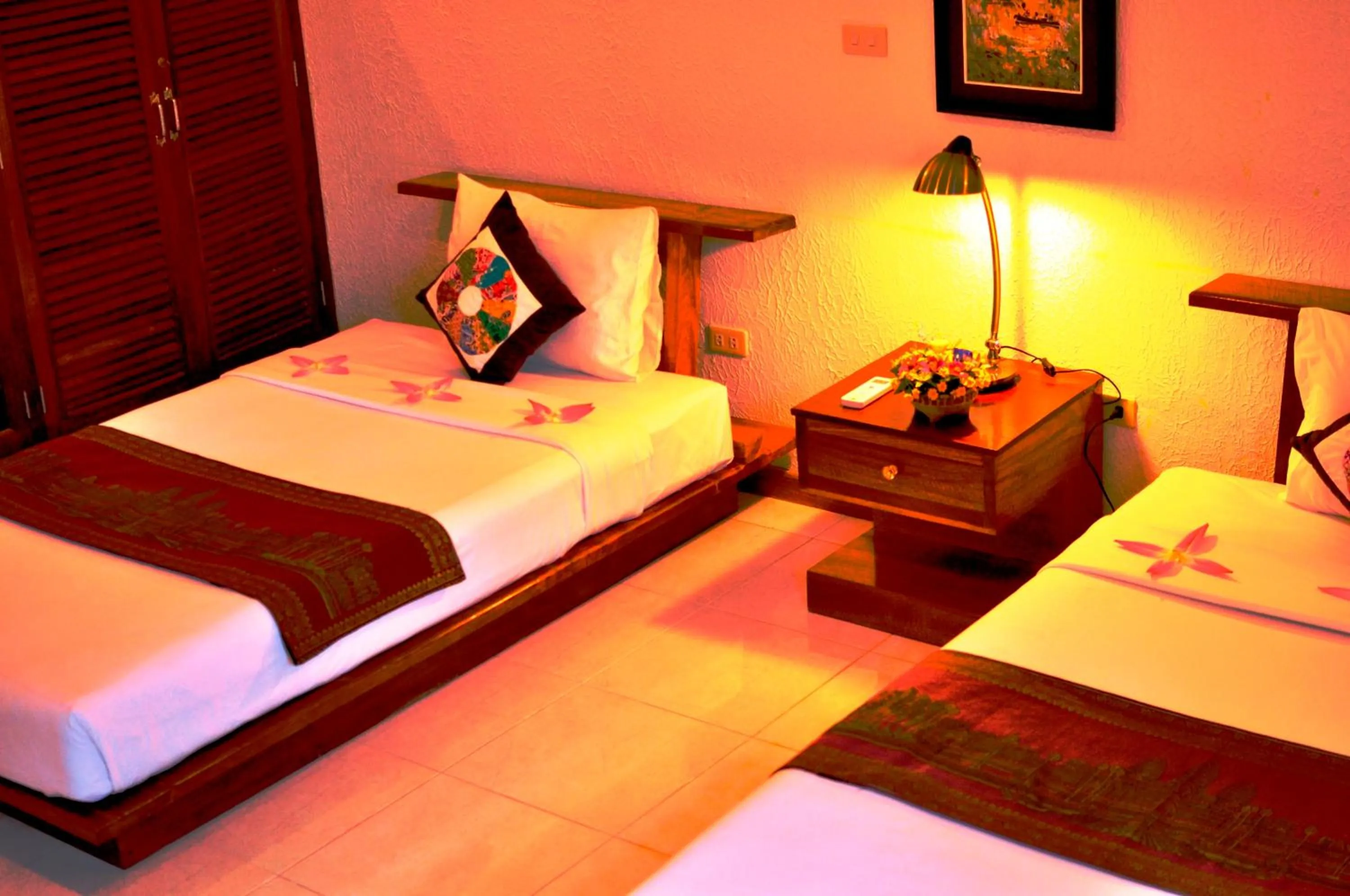 Bed in Memoria Palace & Resort