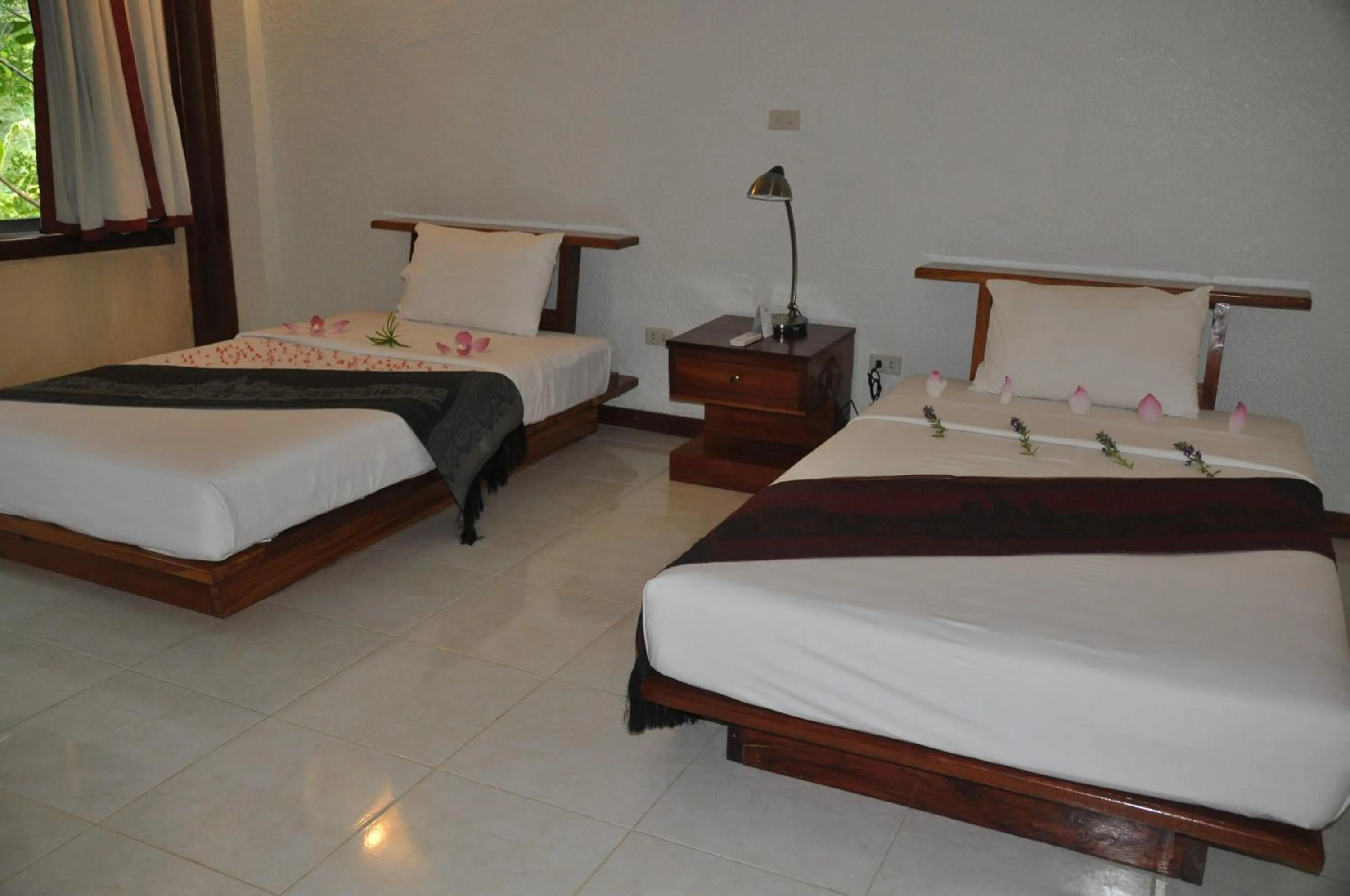 Bed in Memoria Palace & Resort