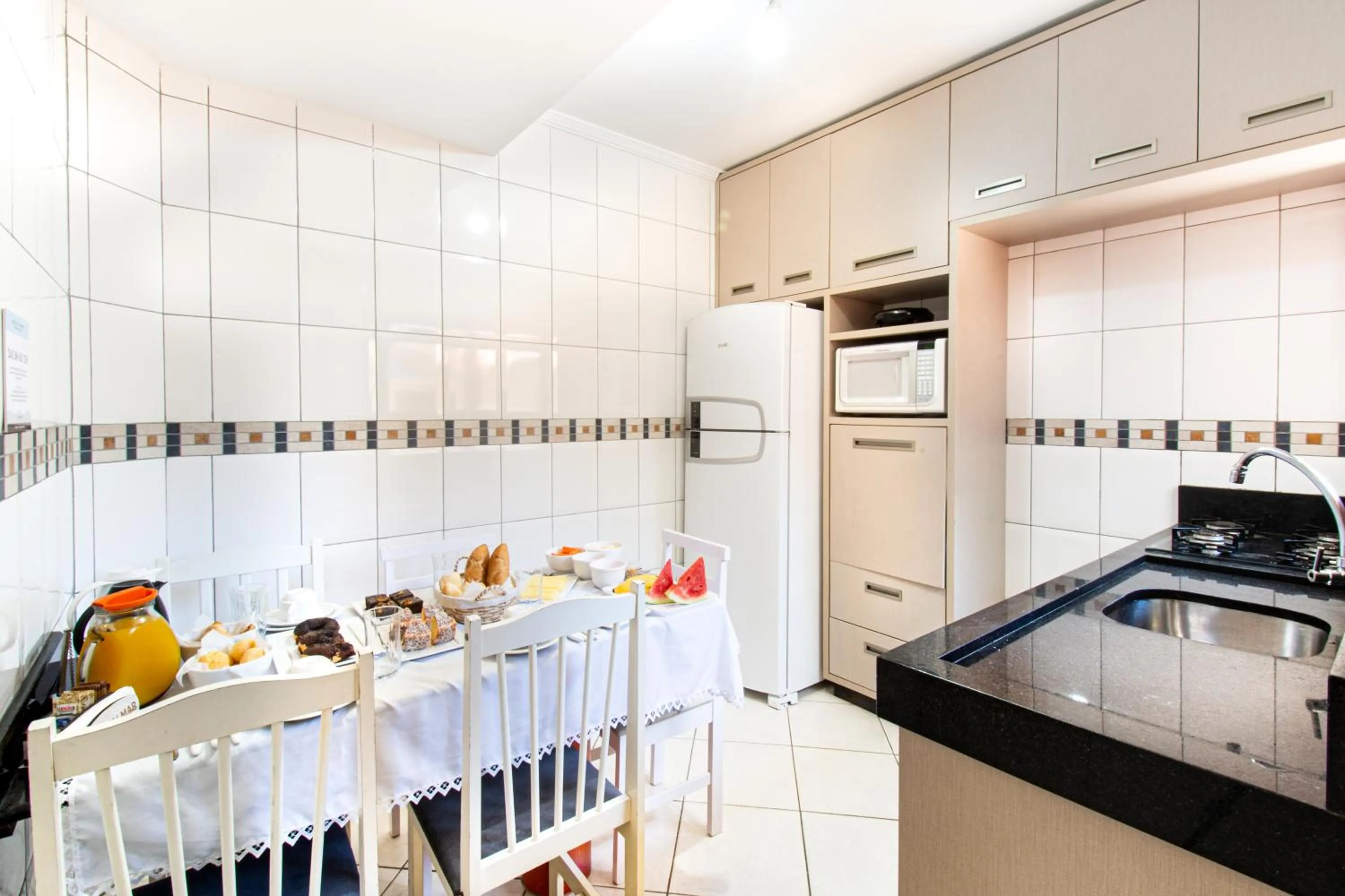 Kitchen or kitchenette in Pousada Cristalmar