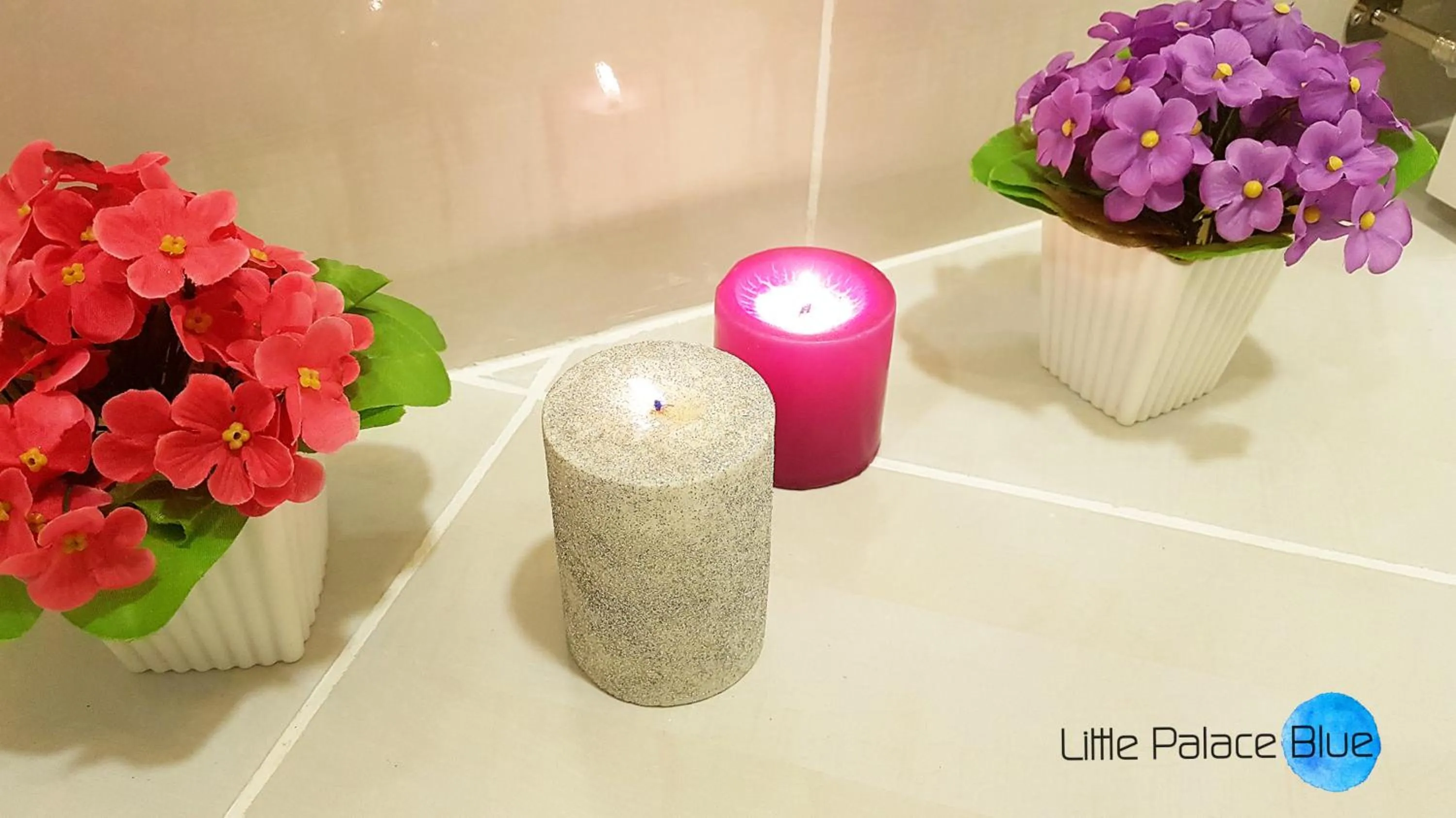 Property logo or sign in Little Palace Blue Apartment