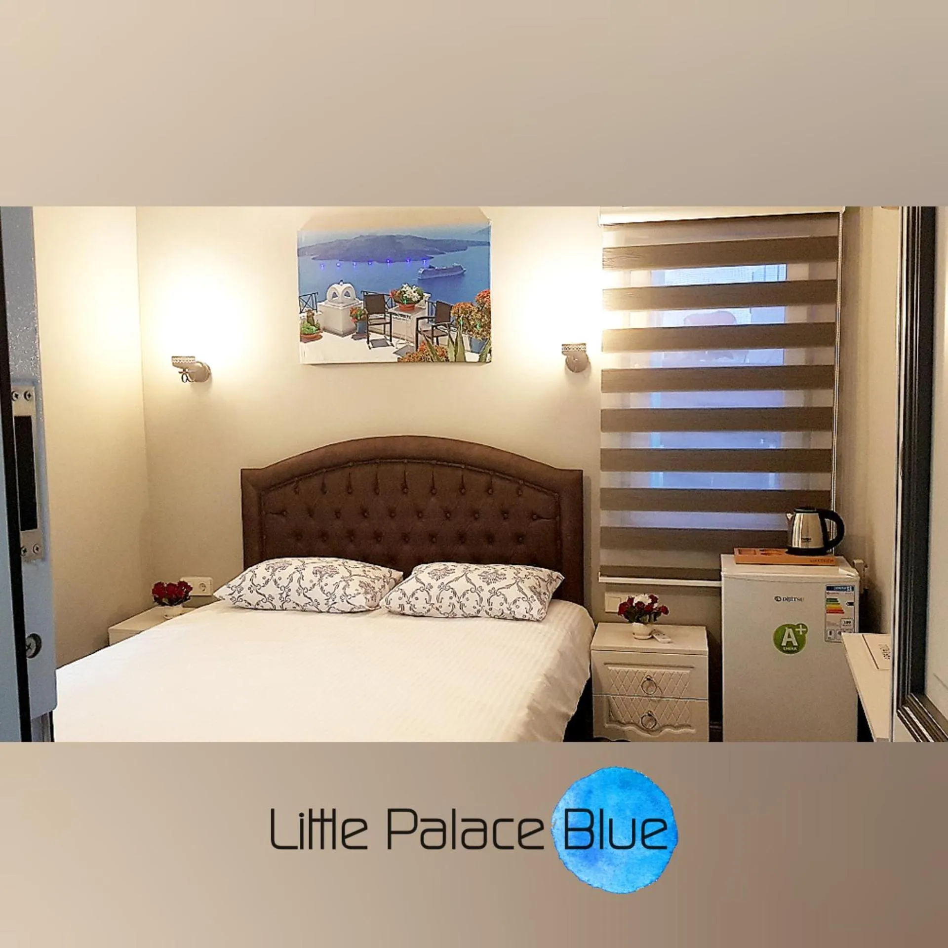 Bed in Little Palace Blue Apartment