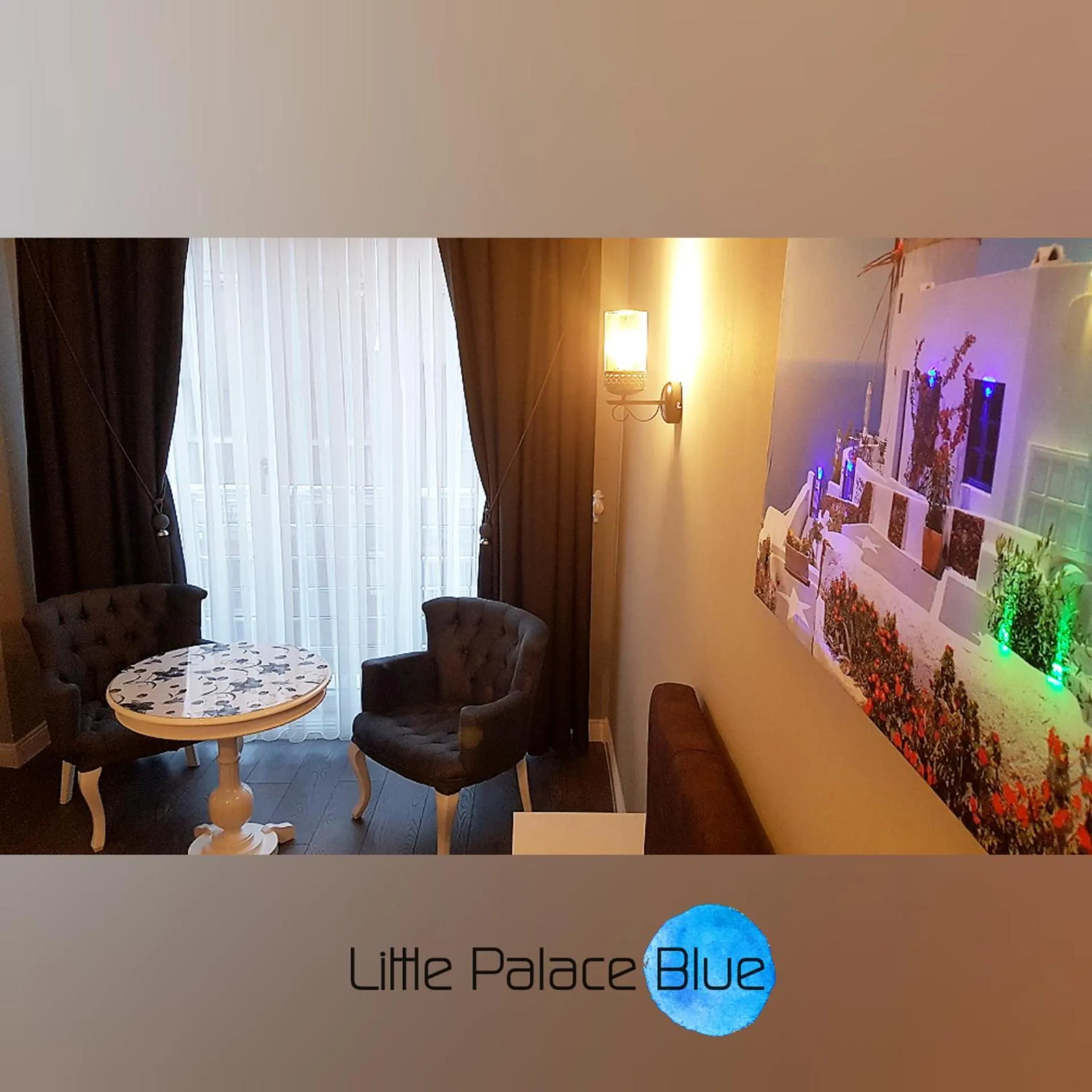 Living room in Little Palace Blue Apartment