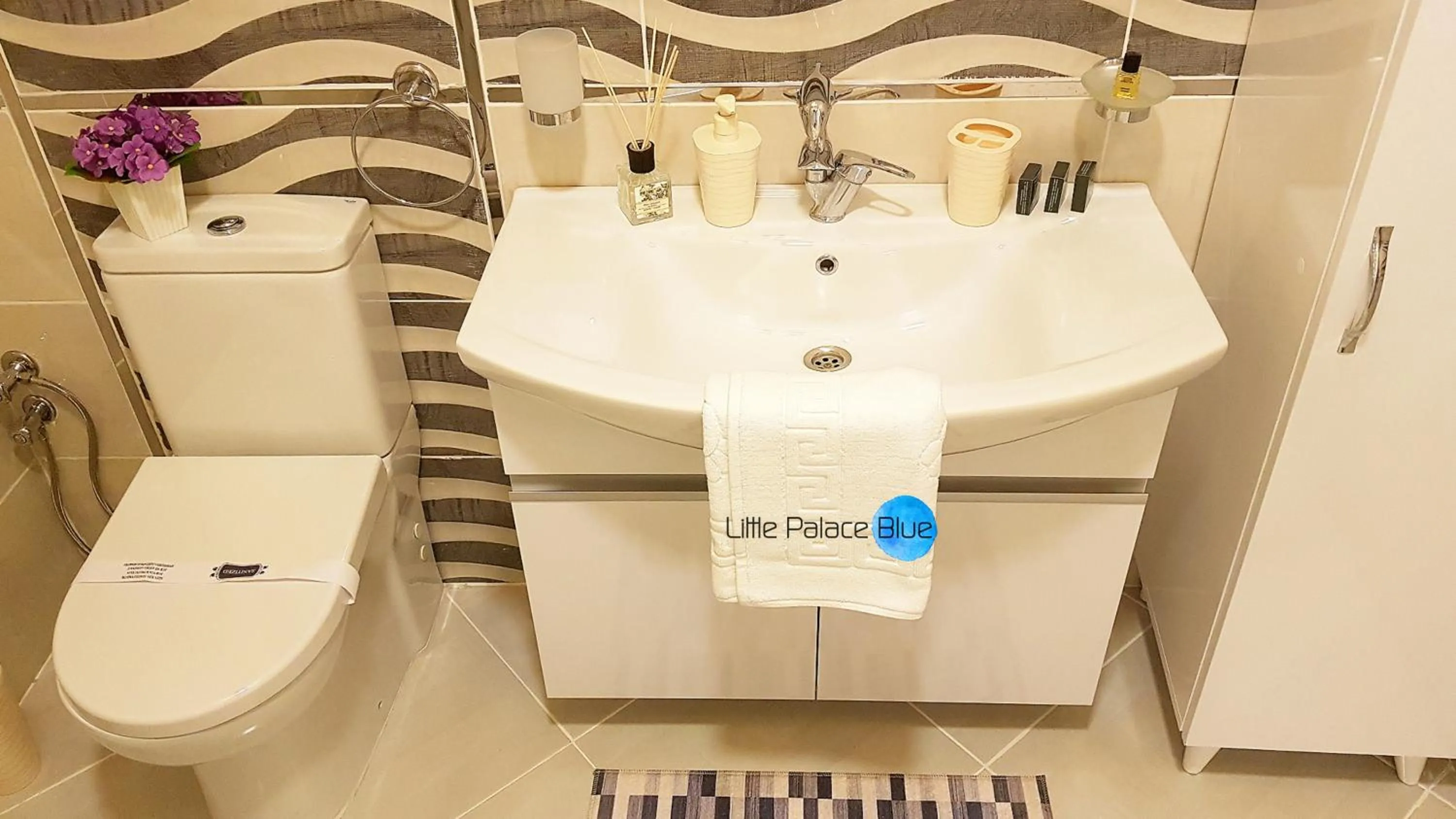 Toilet in Little Palace Blue Apartment