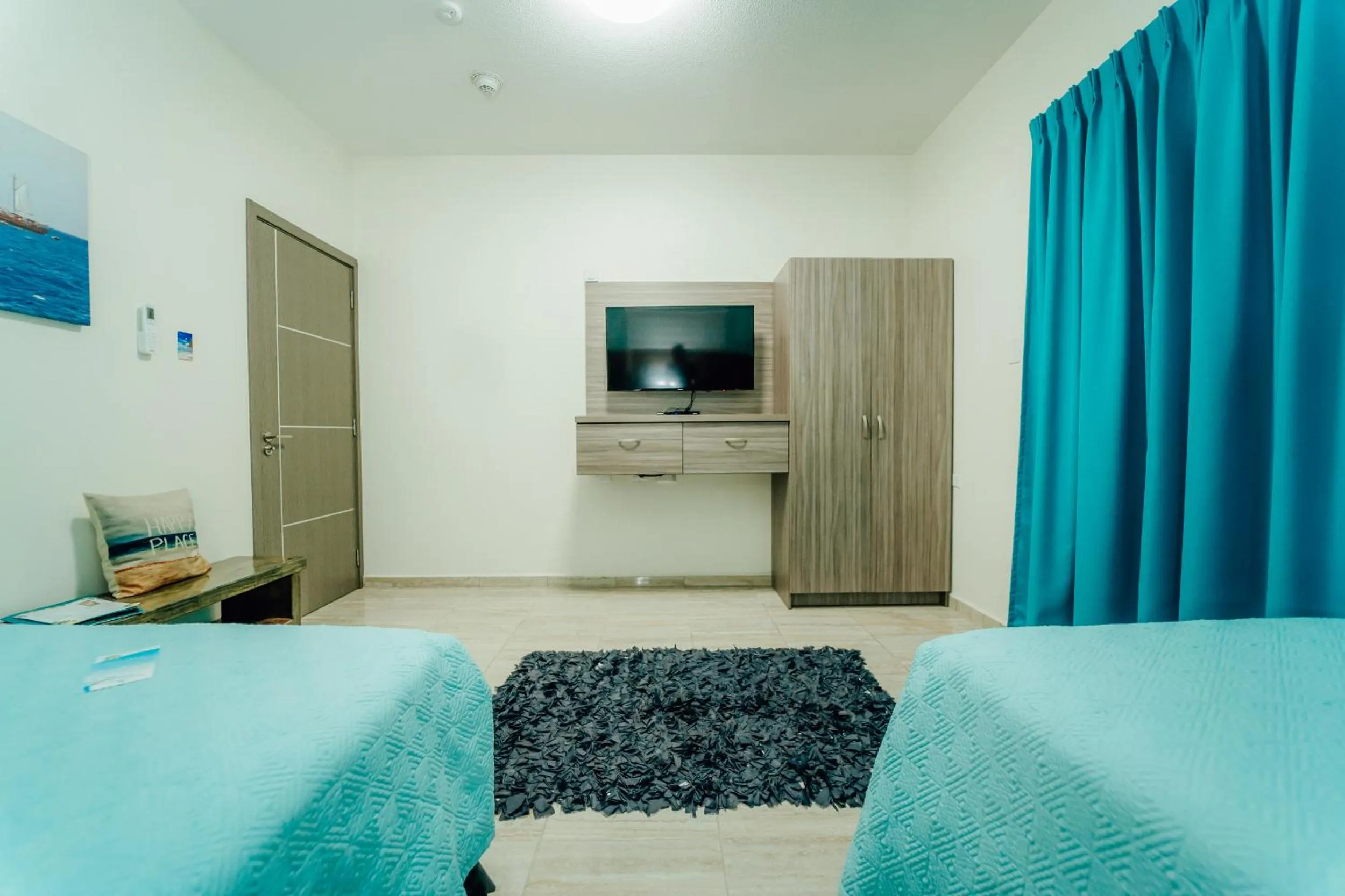 Bedroom, Bed in Hotel RH Boutique Aruba