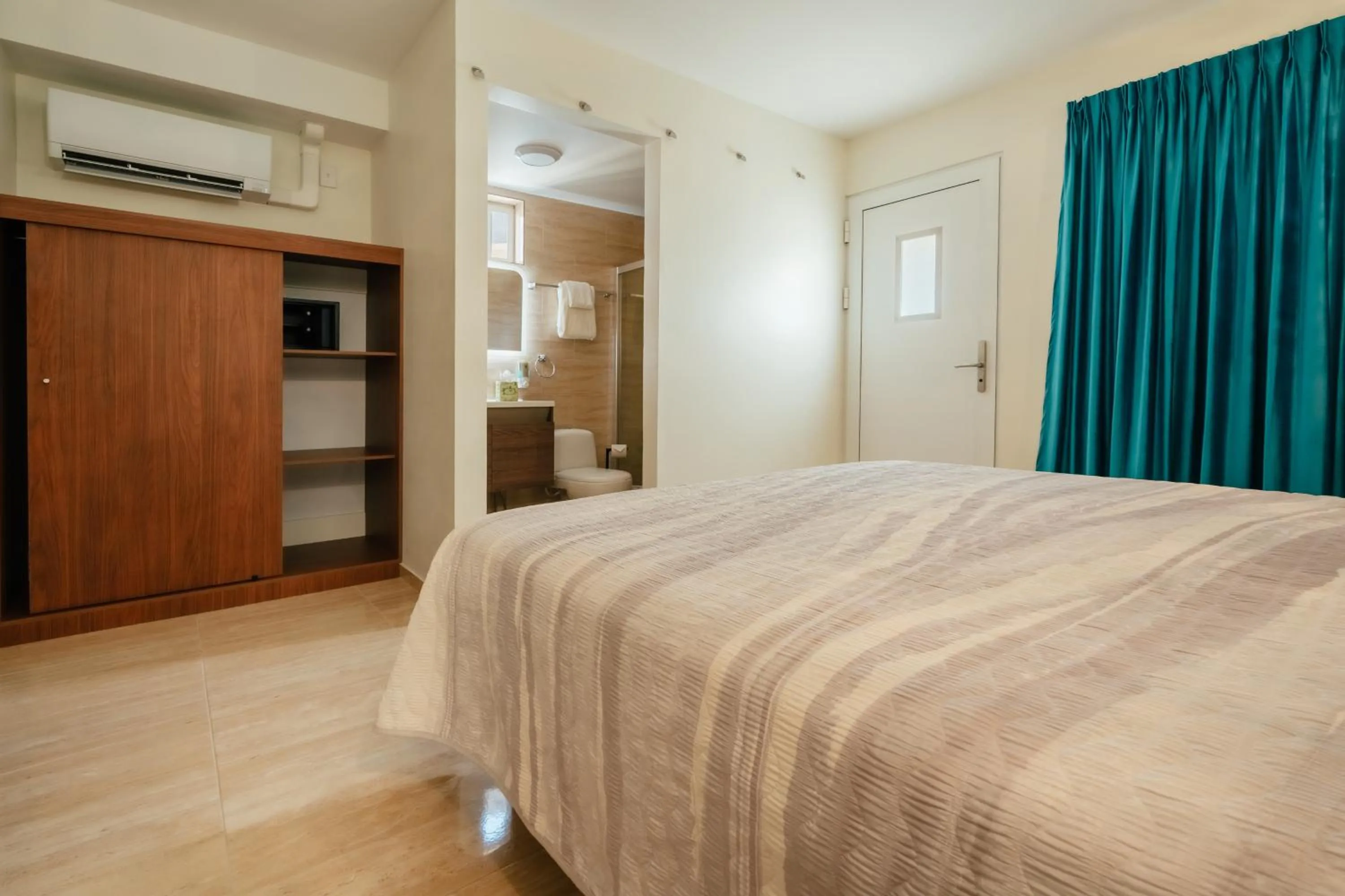 Bed in Hotel RH Boutique Aruba