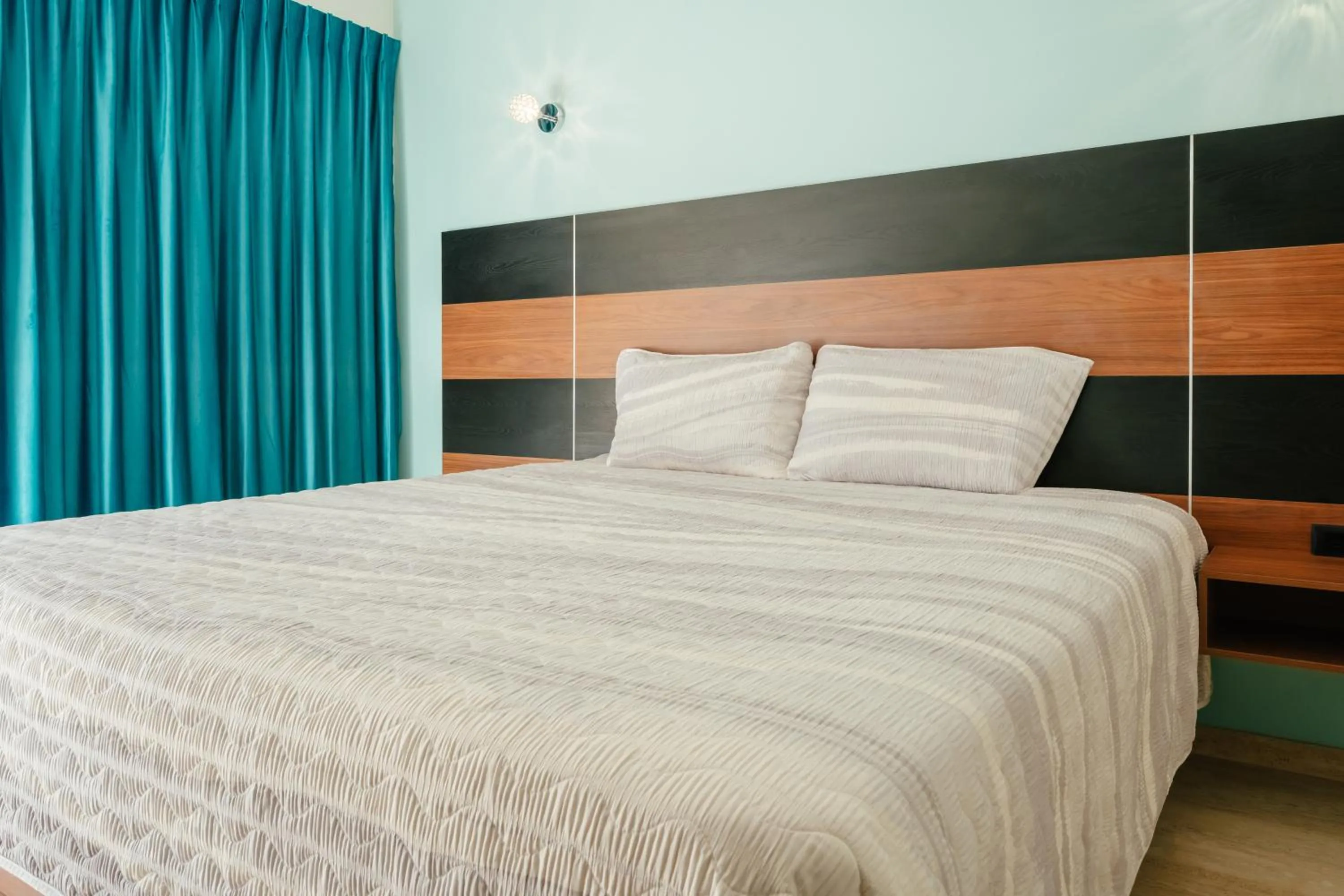 Bed in Hotel RH Boutique Aruba