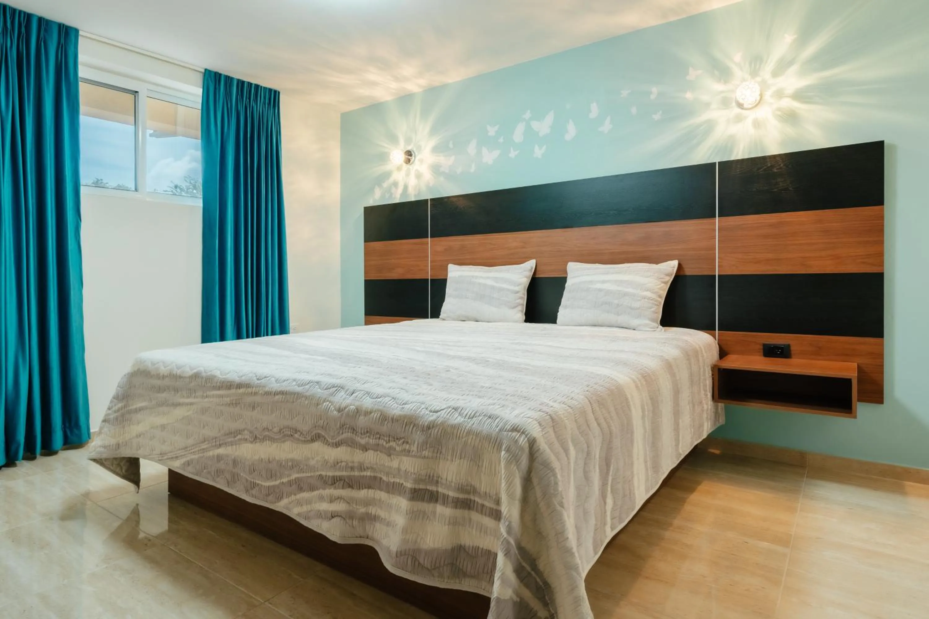 Bed in Hotel RH Boutique Aruba