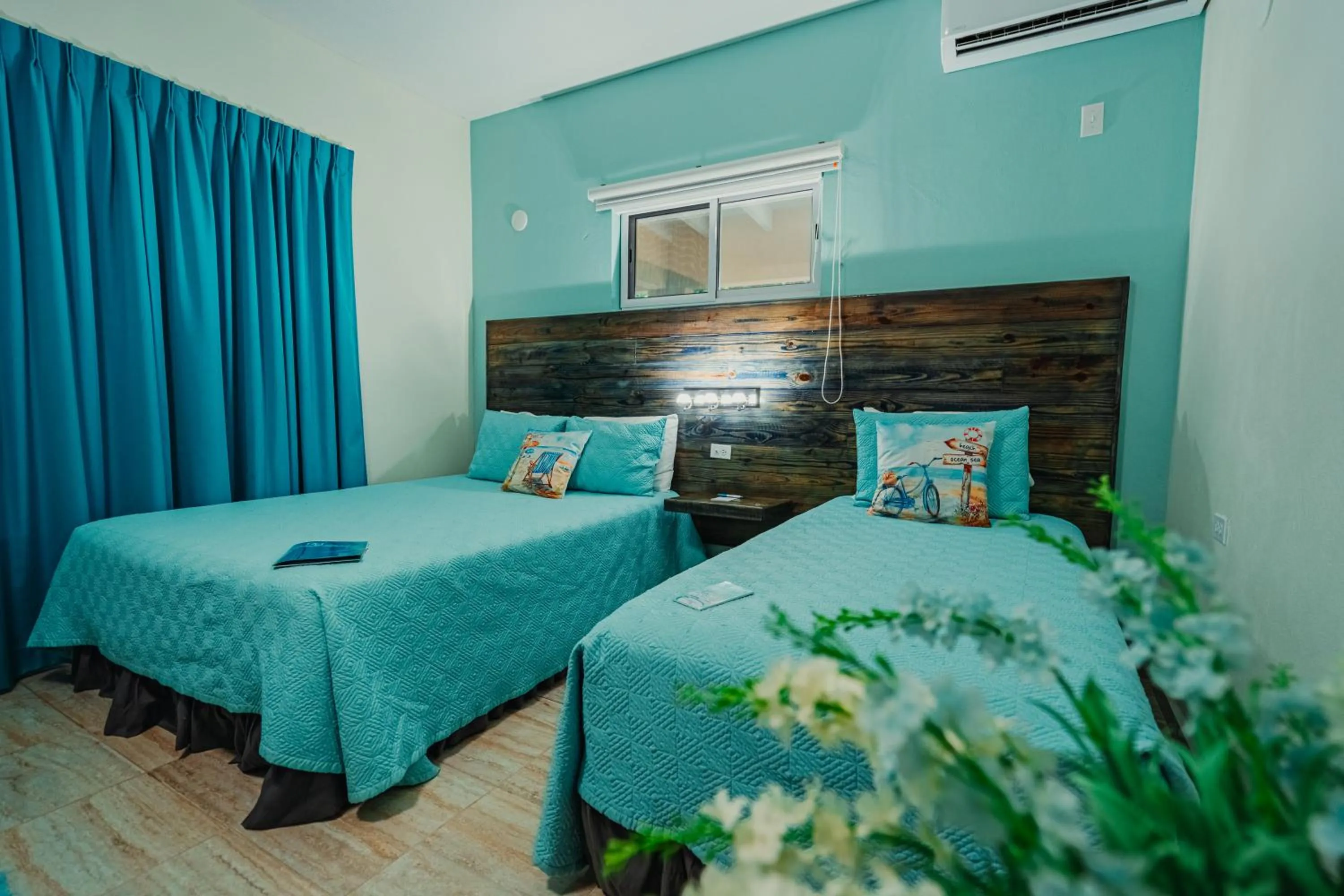 Bed in Hotel RH Boutique Aruba