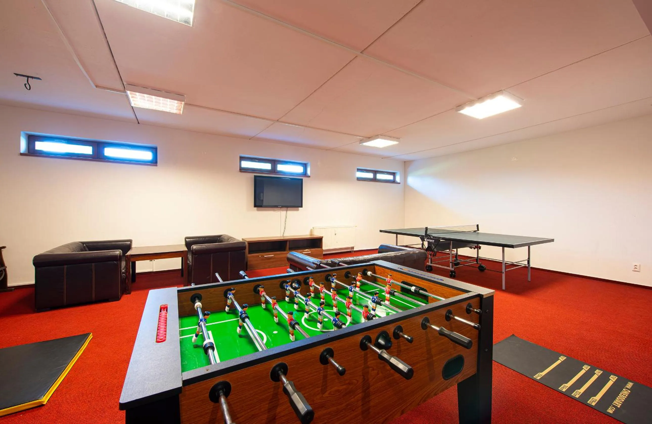 Communal lounge/ TV room in Apartmany Sileas