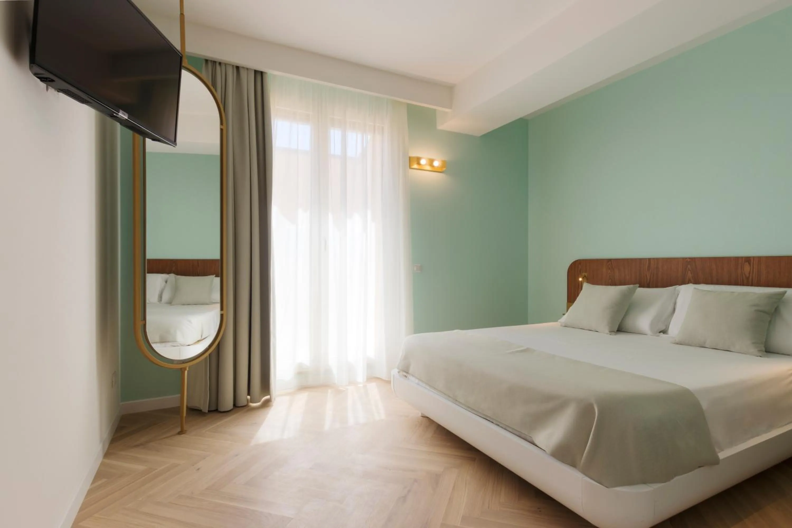 Bed in Metropolitan Suites