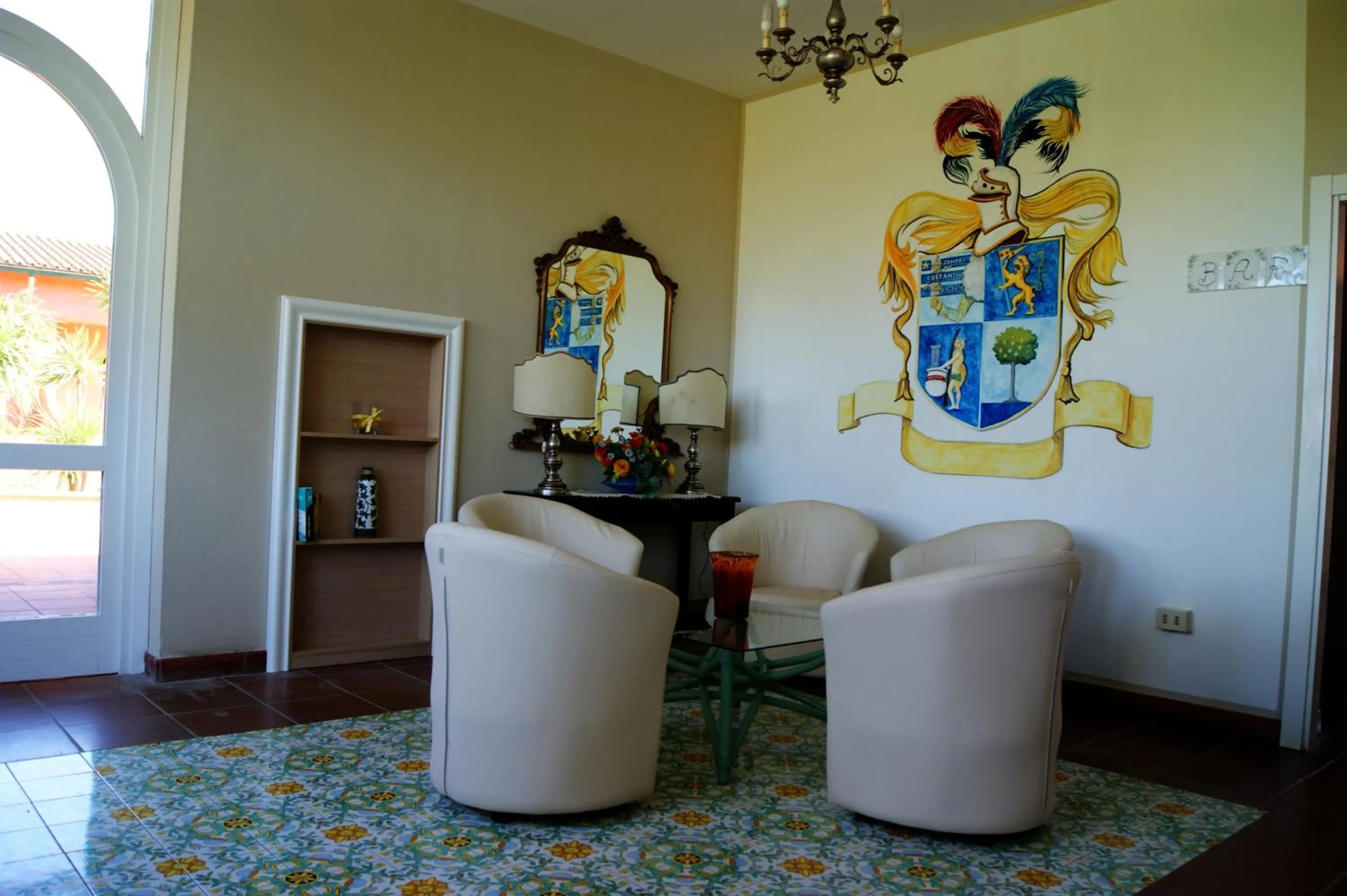 Communal lounge/ TV room in Hotel Residence Villa San Giovanni