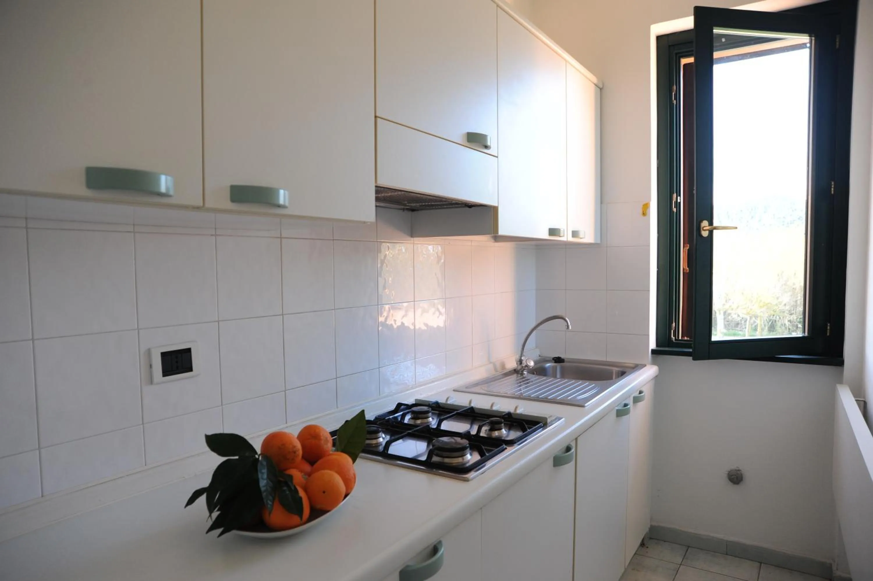 Kitchen or kitchenette in Hotel Residence Villa San Giovanni