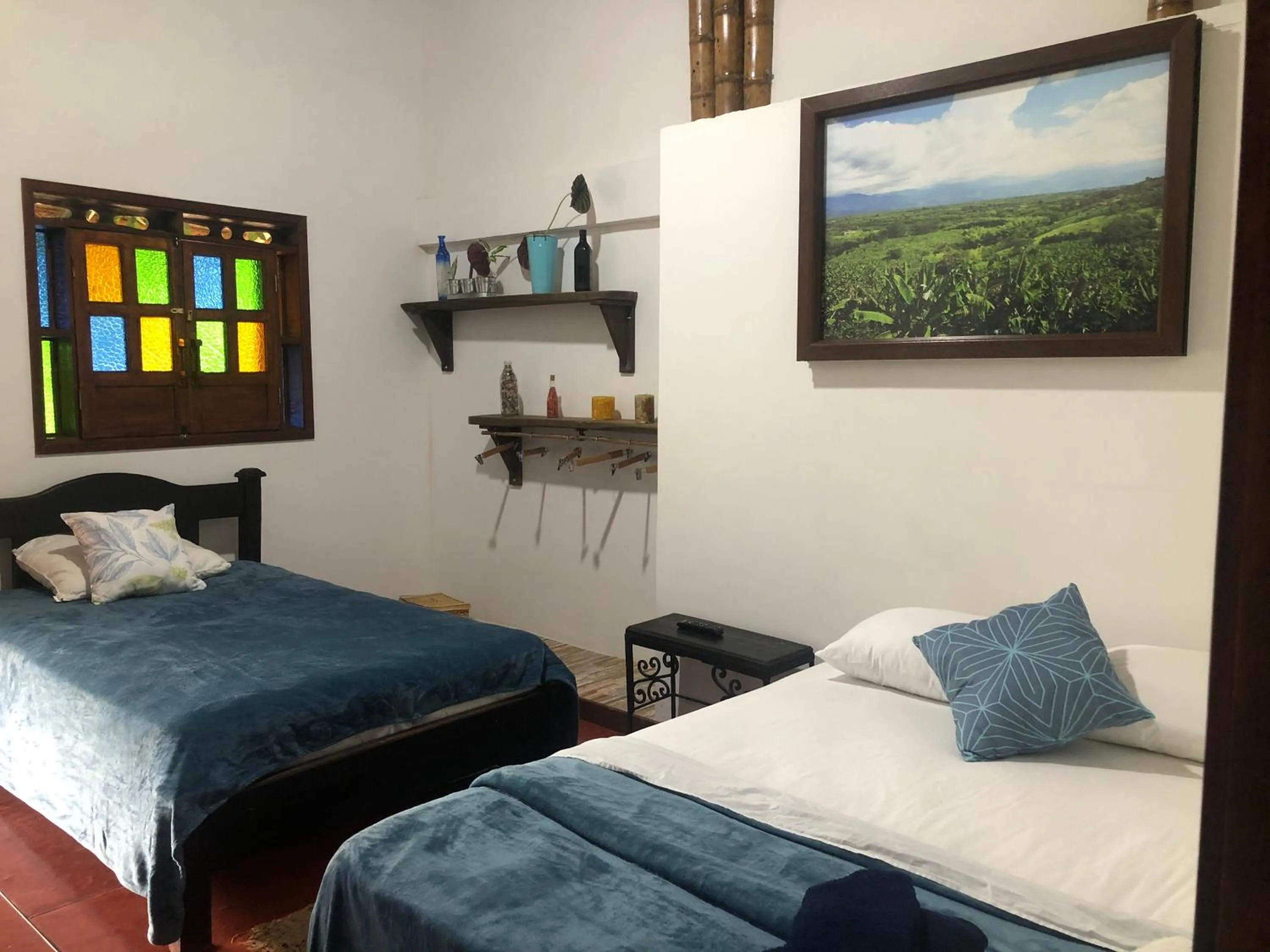 Bed in Finca Hotel Brasilia