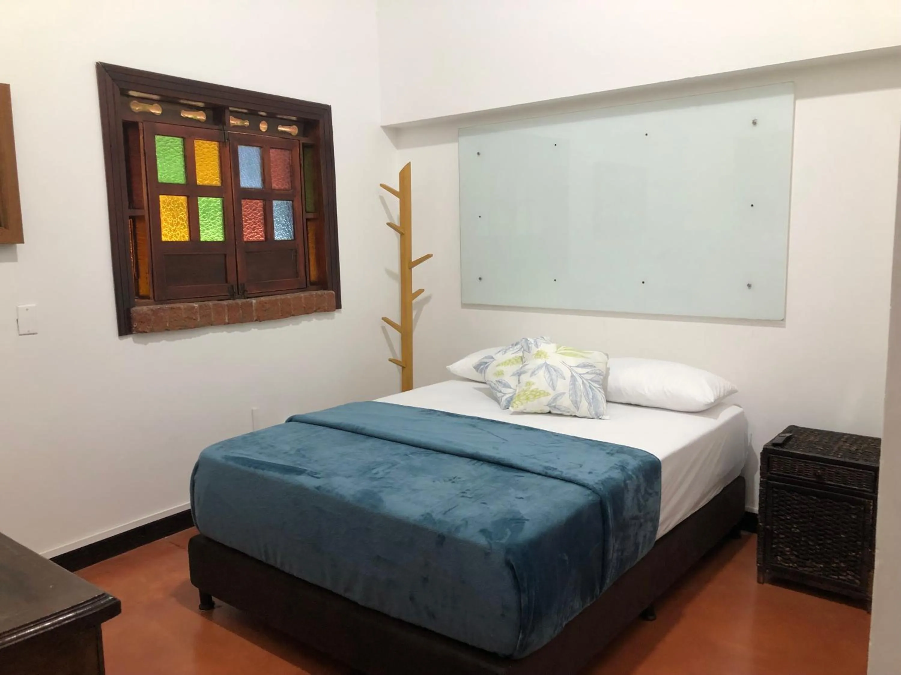 Bed in Finca Hotel Brasilia