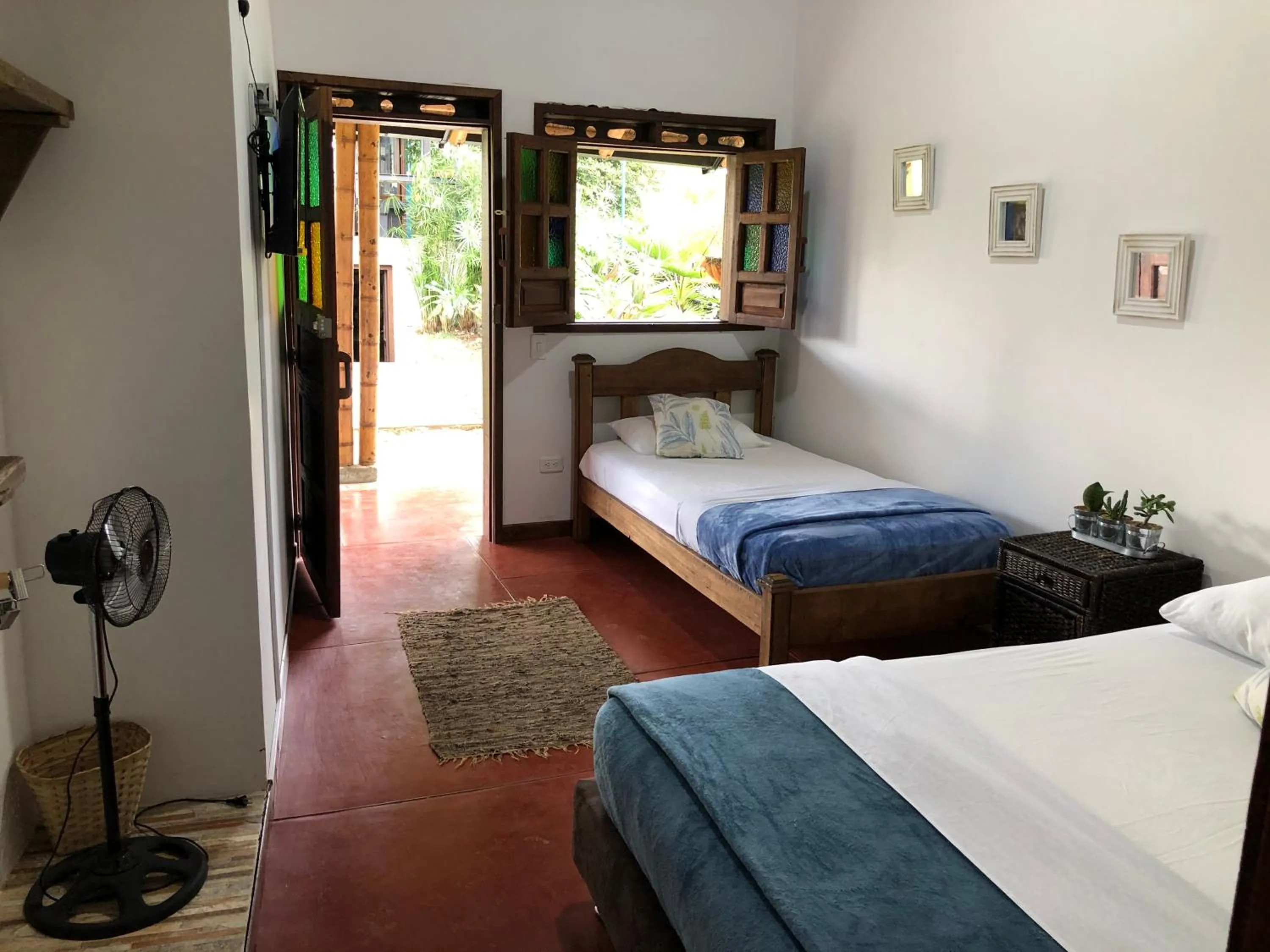 Bed in Finca Hotel Brasilia