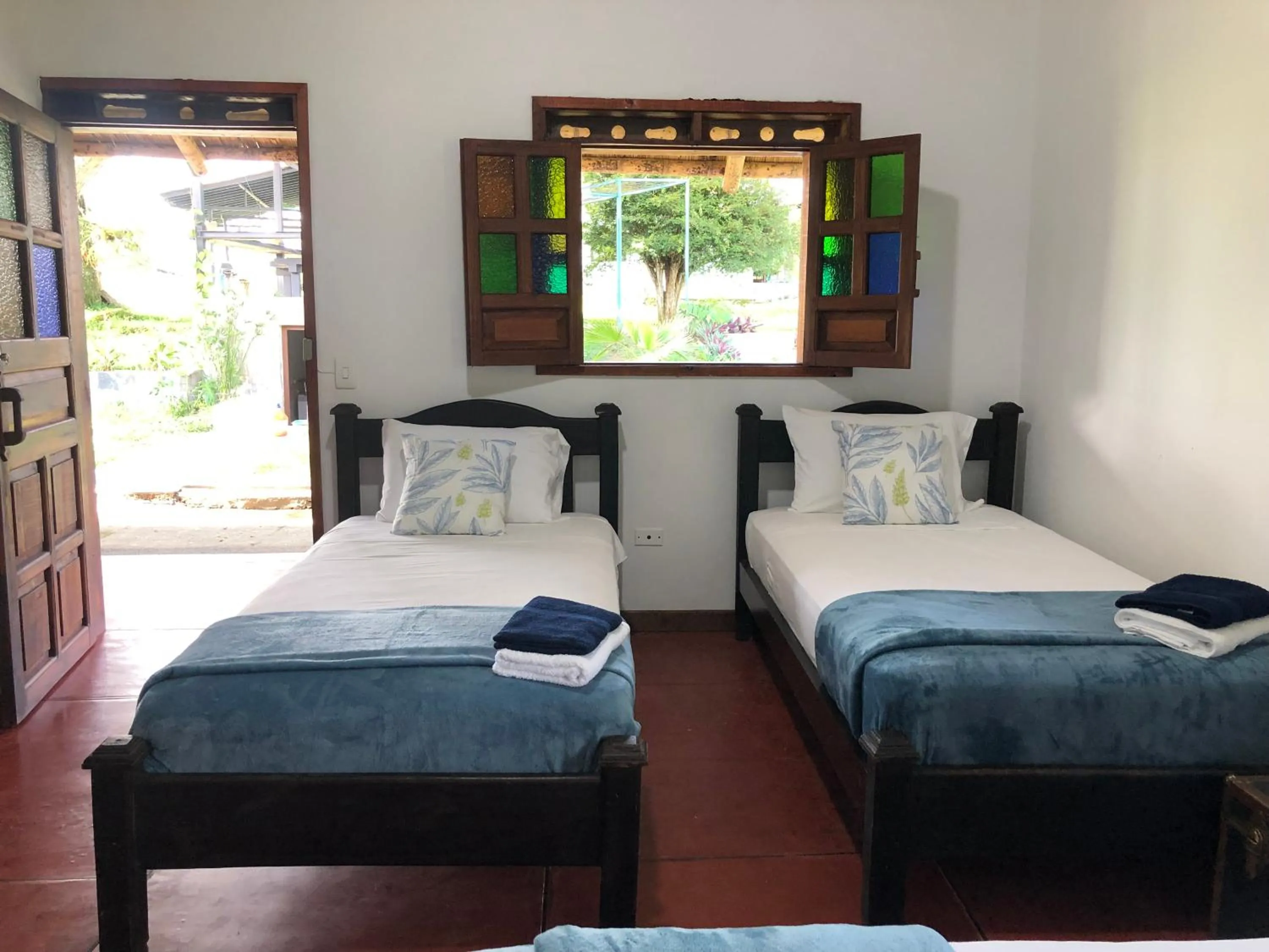 Bed in Finca Hotel Brasilia