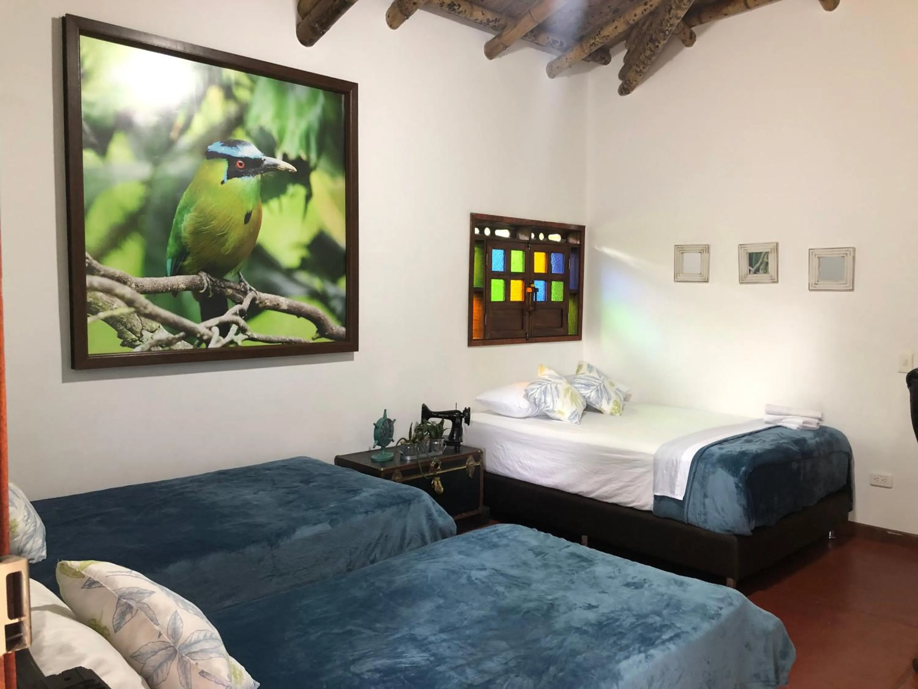 Bed in Finca Hotel Brasilia