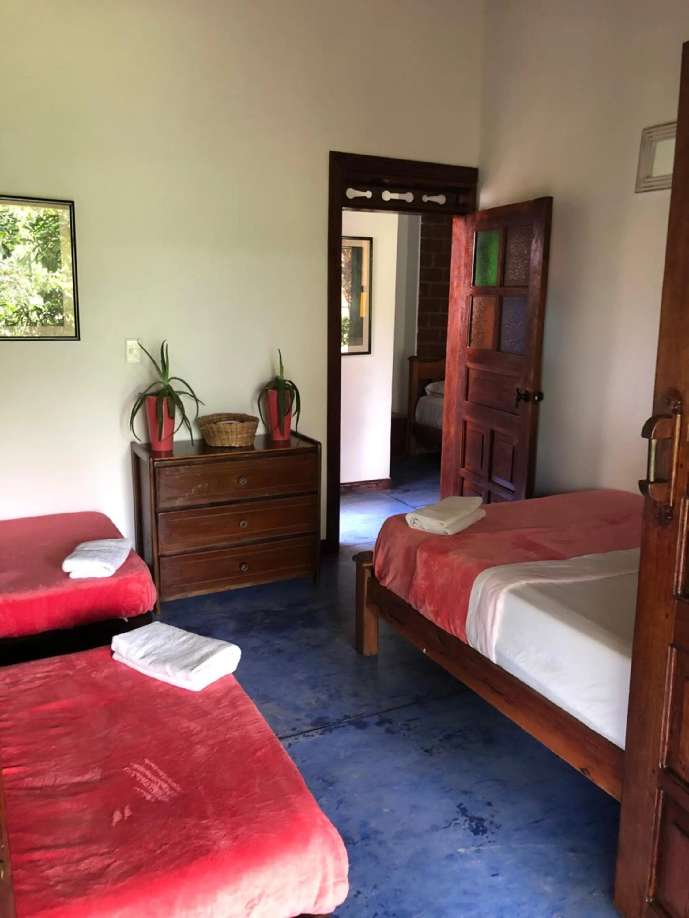 Bed in Finca Hotel Brasilia