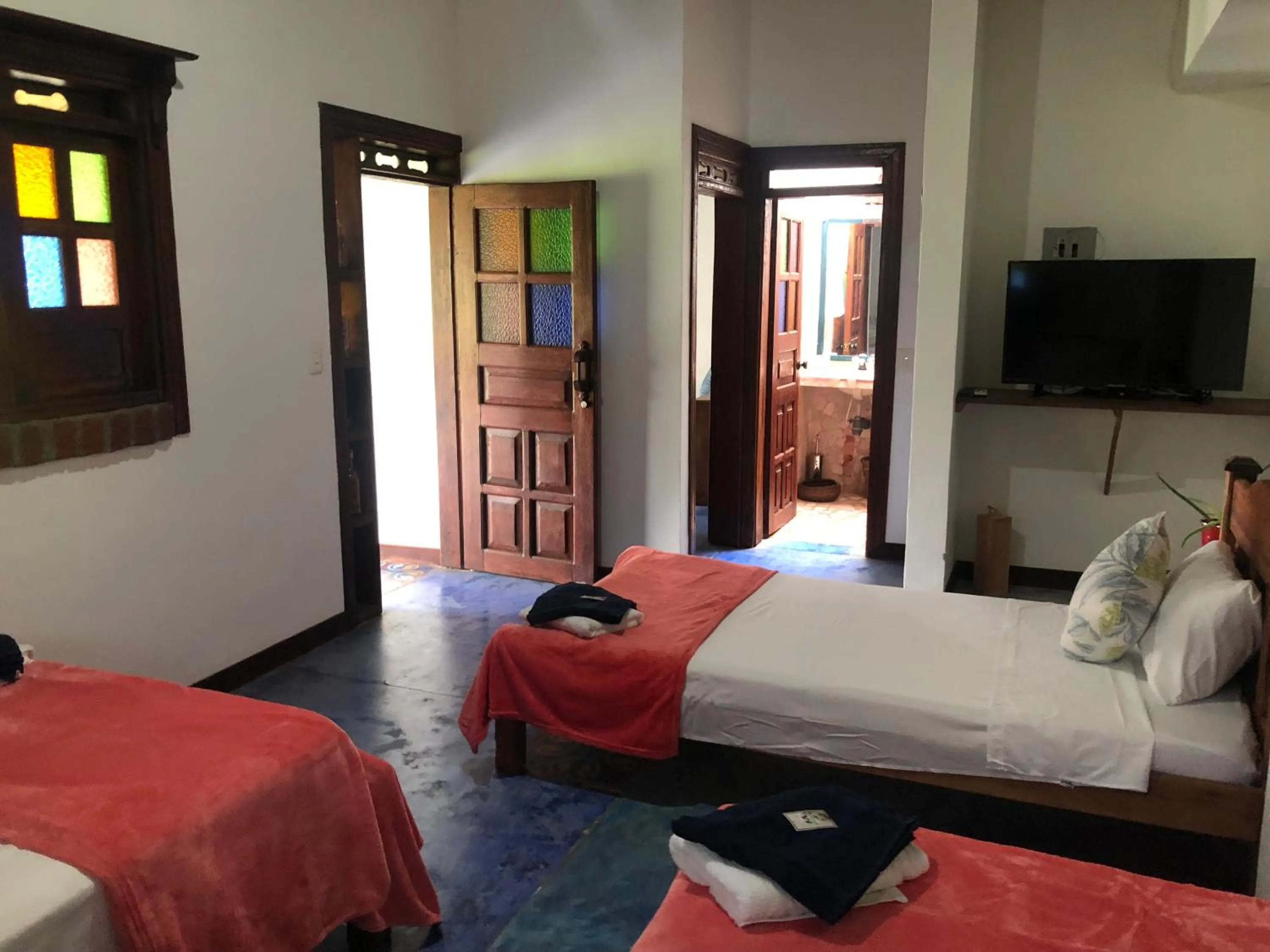 Bed in Finca Hotel Brasilia