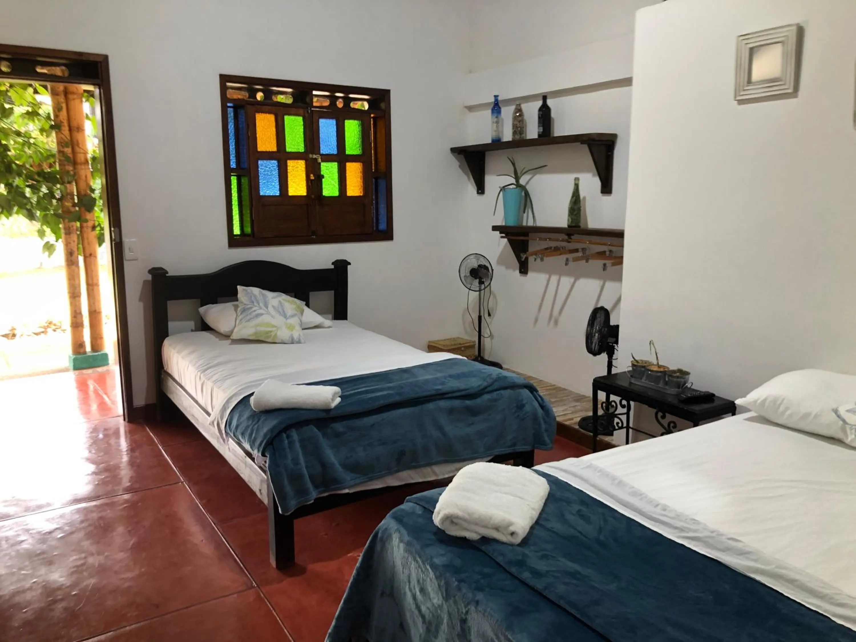 Bed in Finca Hotel Brasilia