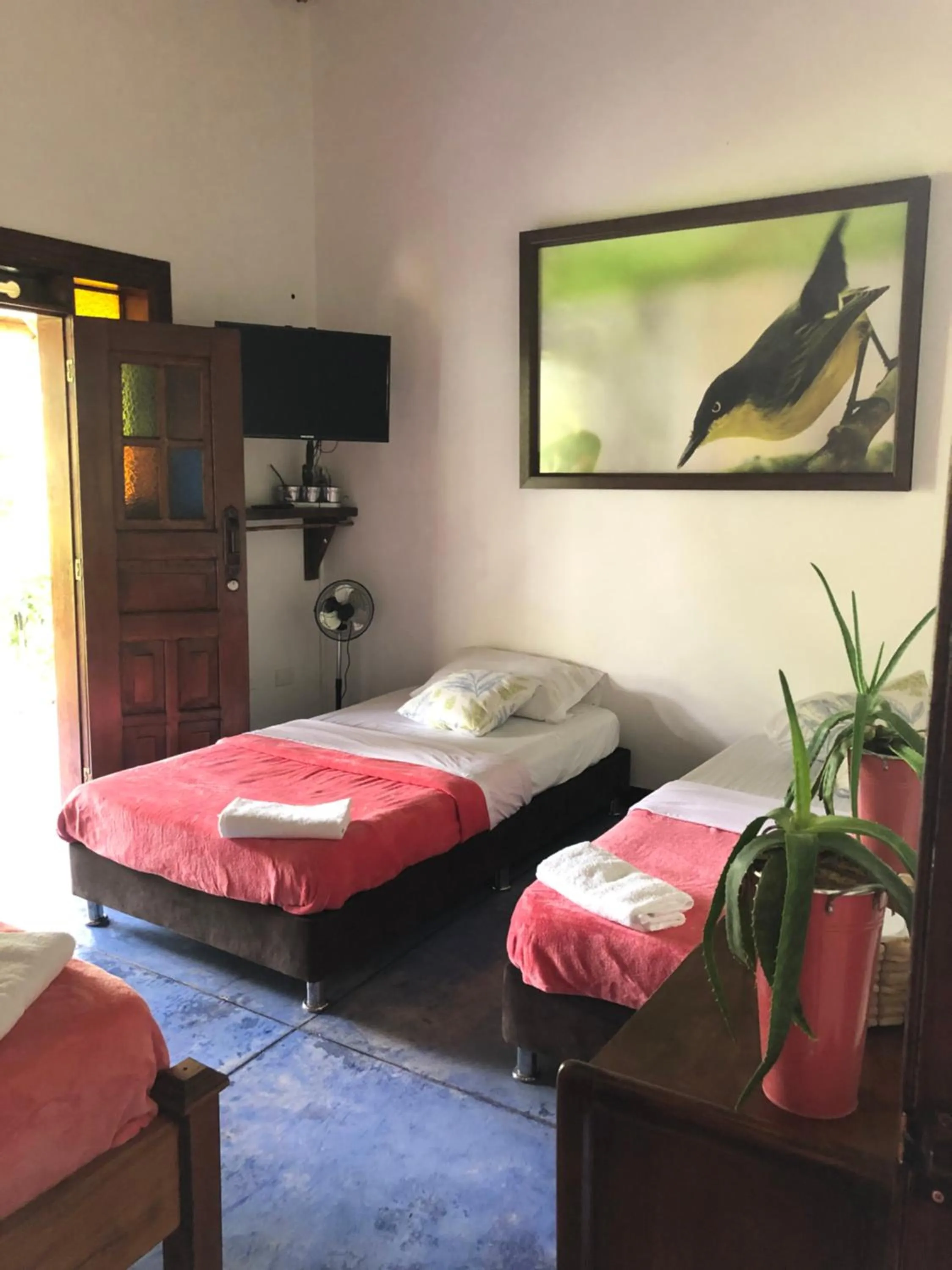 Bed in Finca Hotel Brasilia