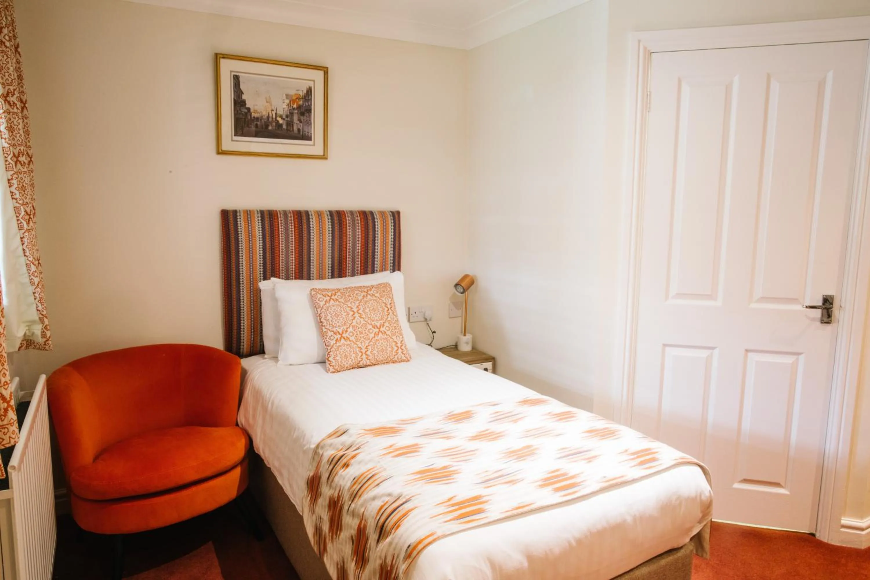 Bed in The Old Fourpenny Hotel