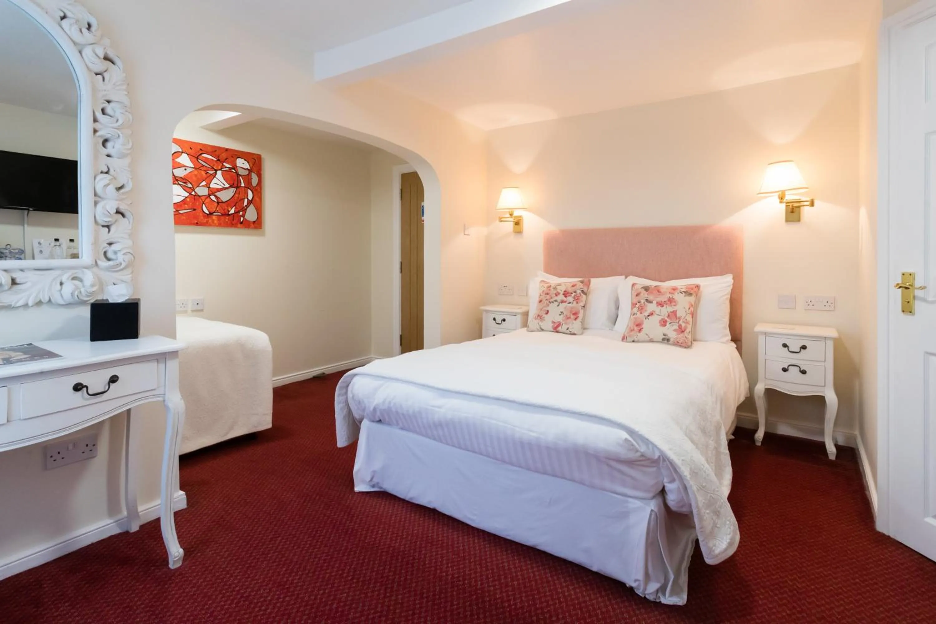 Bed in The Old Fourpenny Hotel