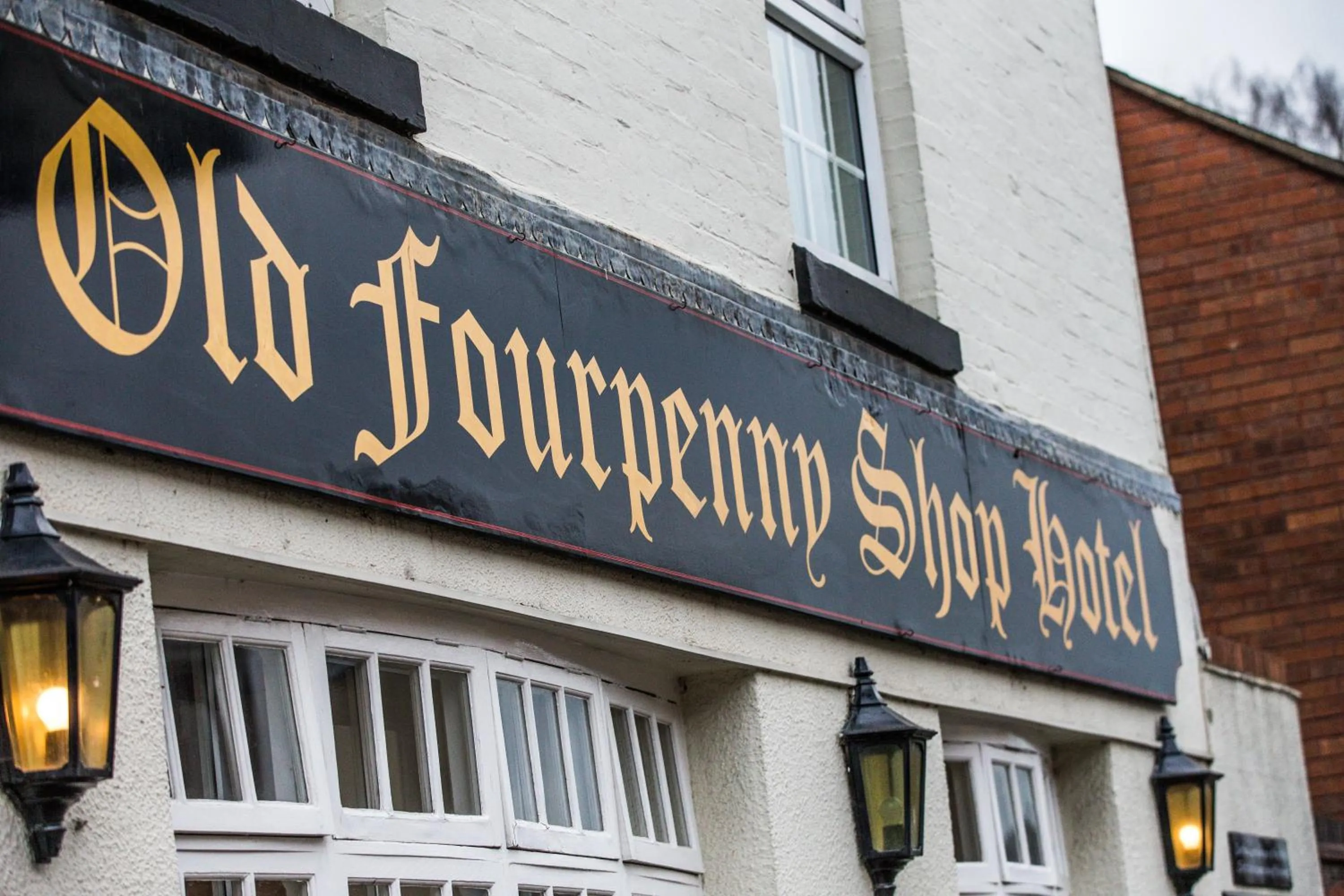 Property logo or sign in The Old Fourpenny Hotel