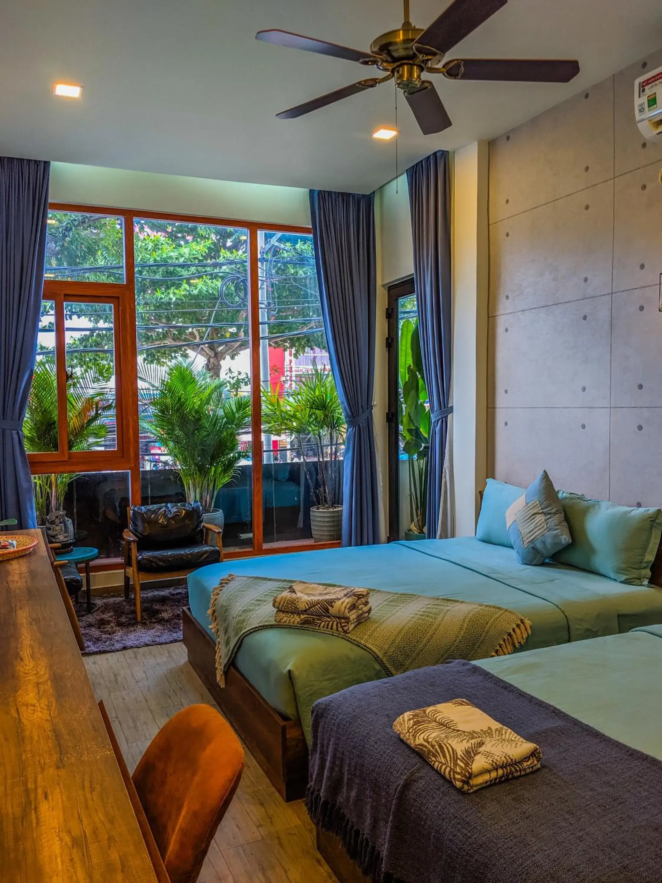 Deluxe Double or Twin Room with Balcony in Magnolia's Can Tho Deluxe Double or Twin Room with Balcony in Magnolia's Can Tho