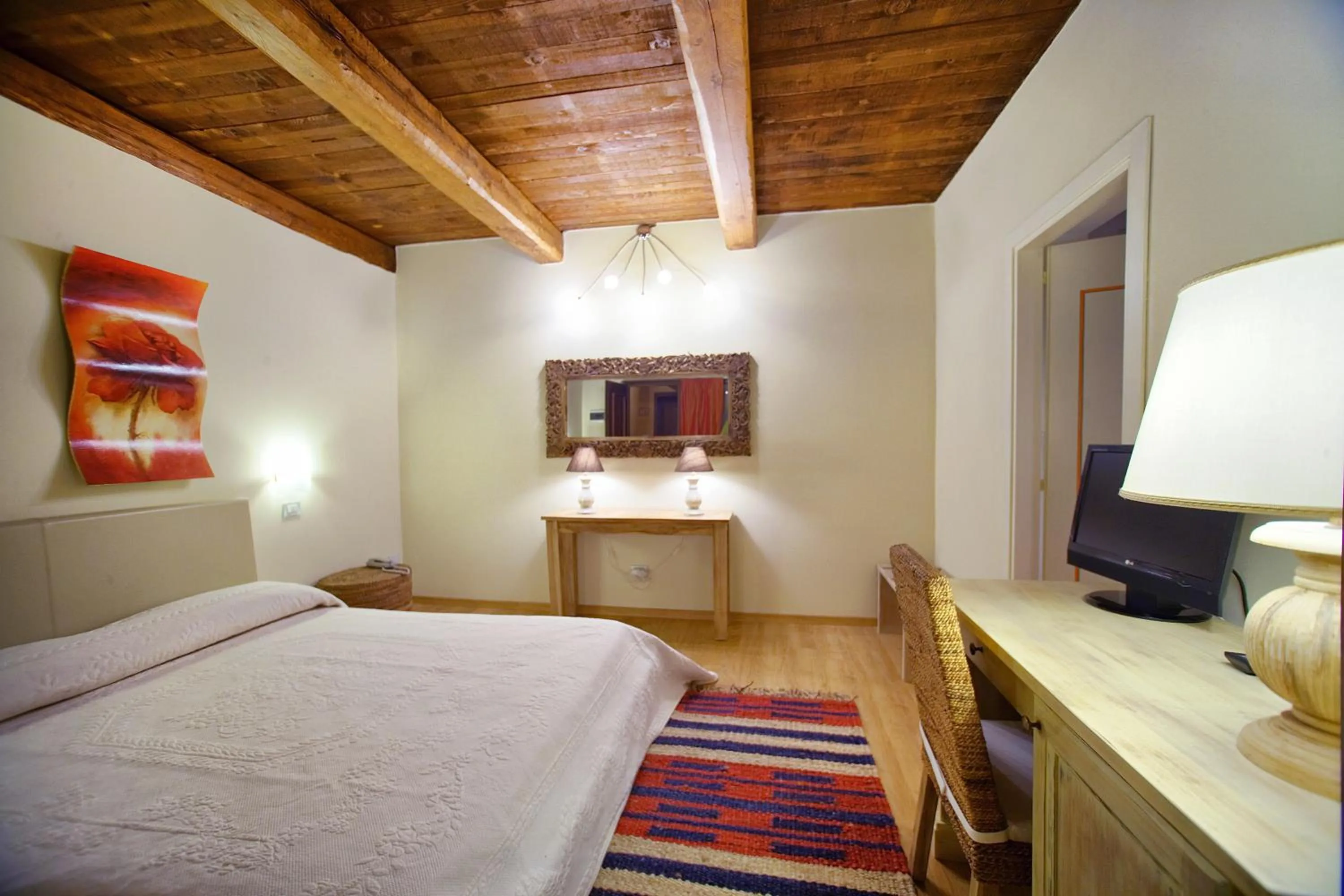 Bed in Il Baio Relais & Natural Spa