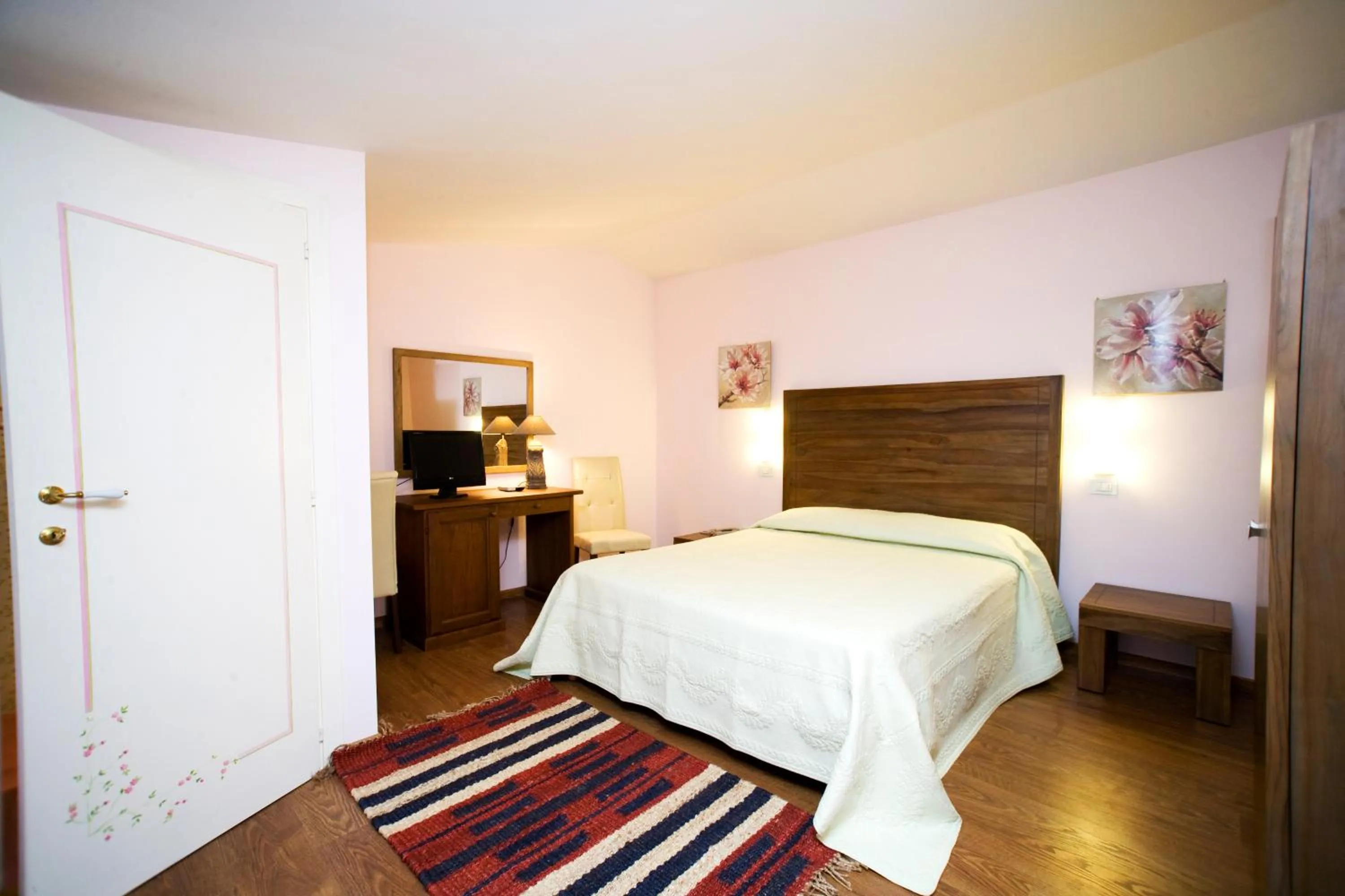 Bed in Il Baio Relais & Natural Spa
