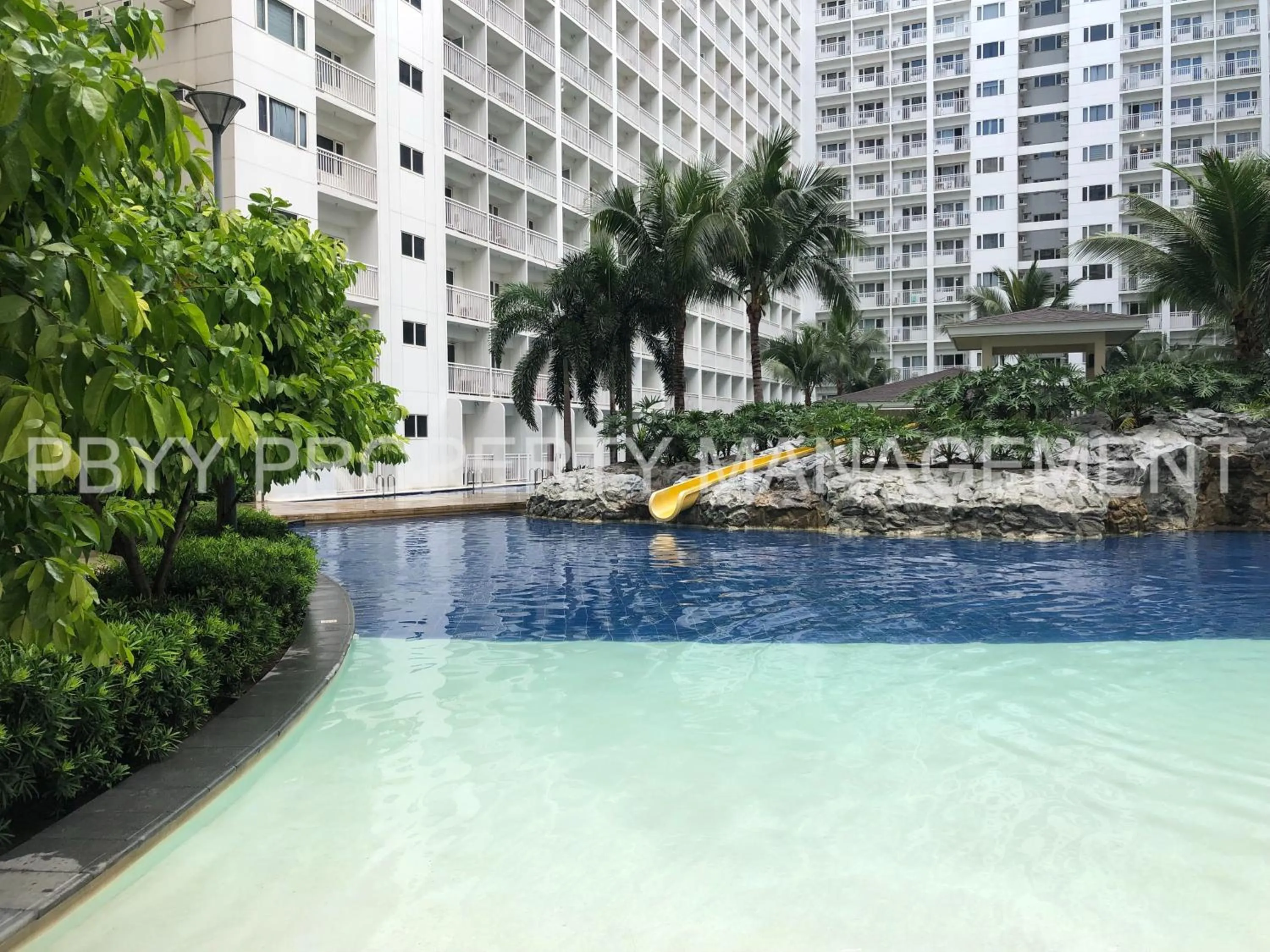 Swimming pool in Shore Residences, Mall Of Asia Complex Stayction by PBYY
