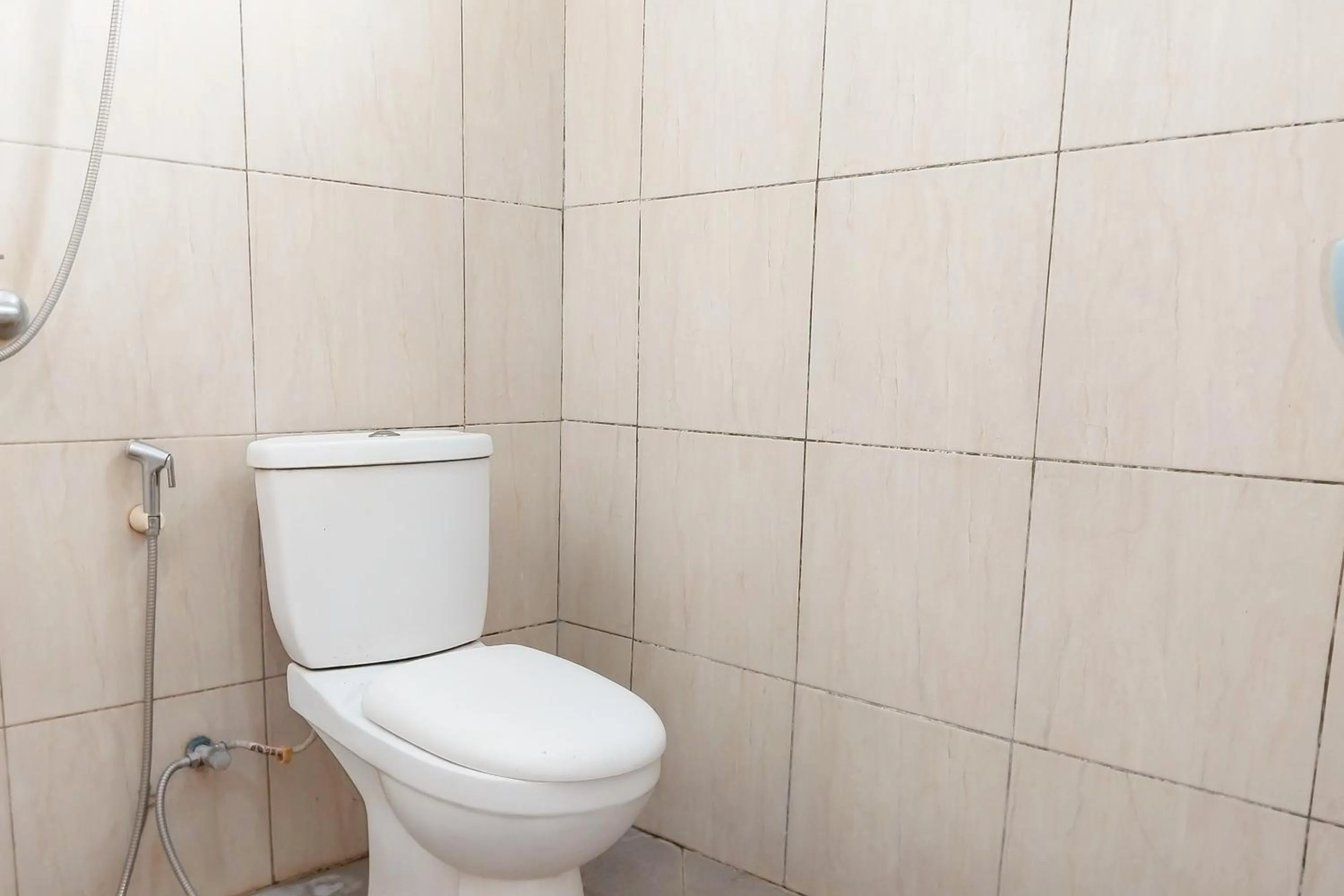 Bathroom in Richmond Guest House Cirebon RedPartner