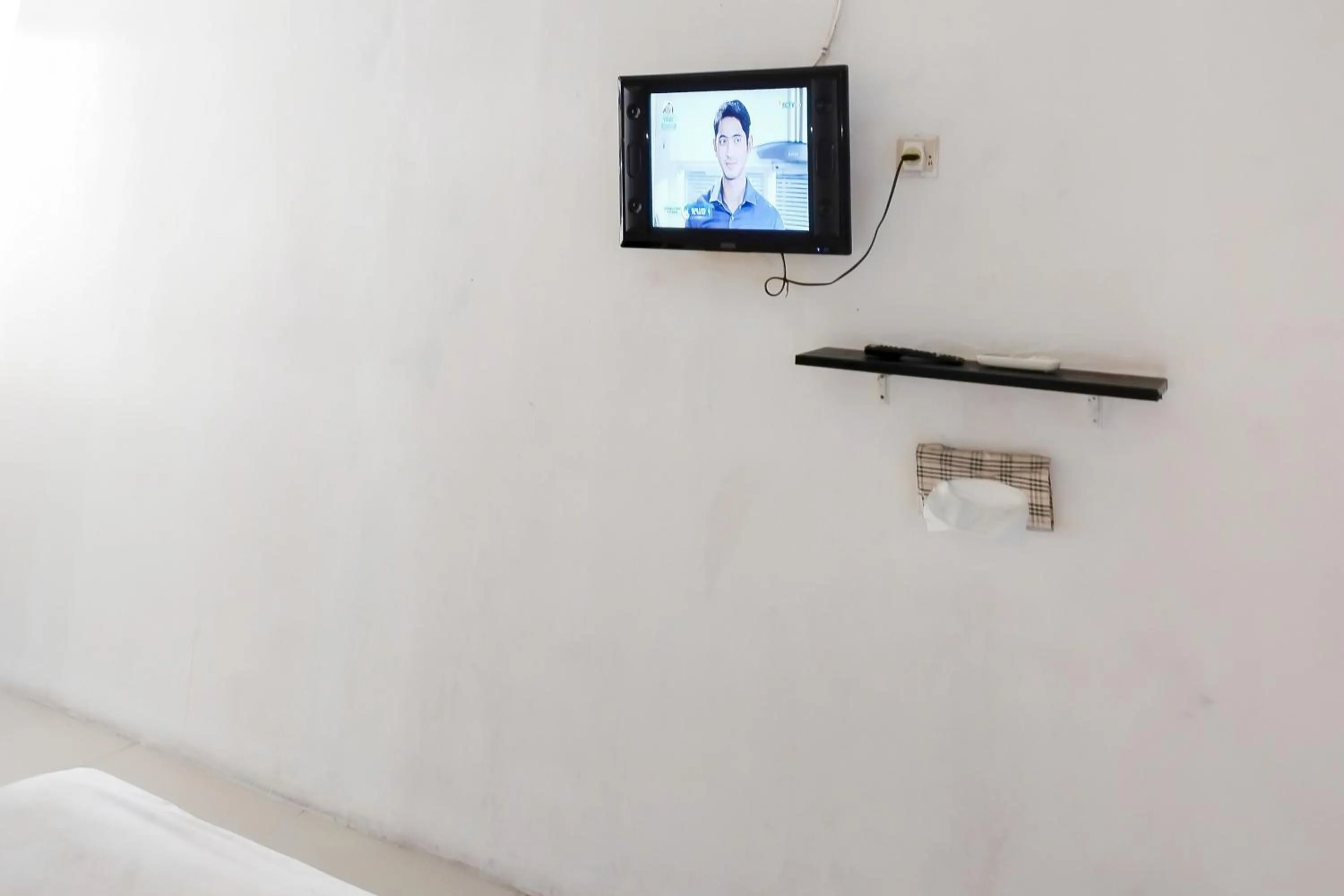 Bedroom in Richmond Guest House Cirebon RedPartner