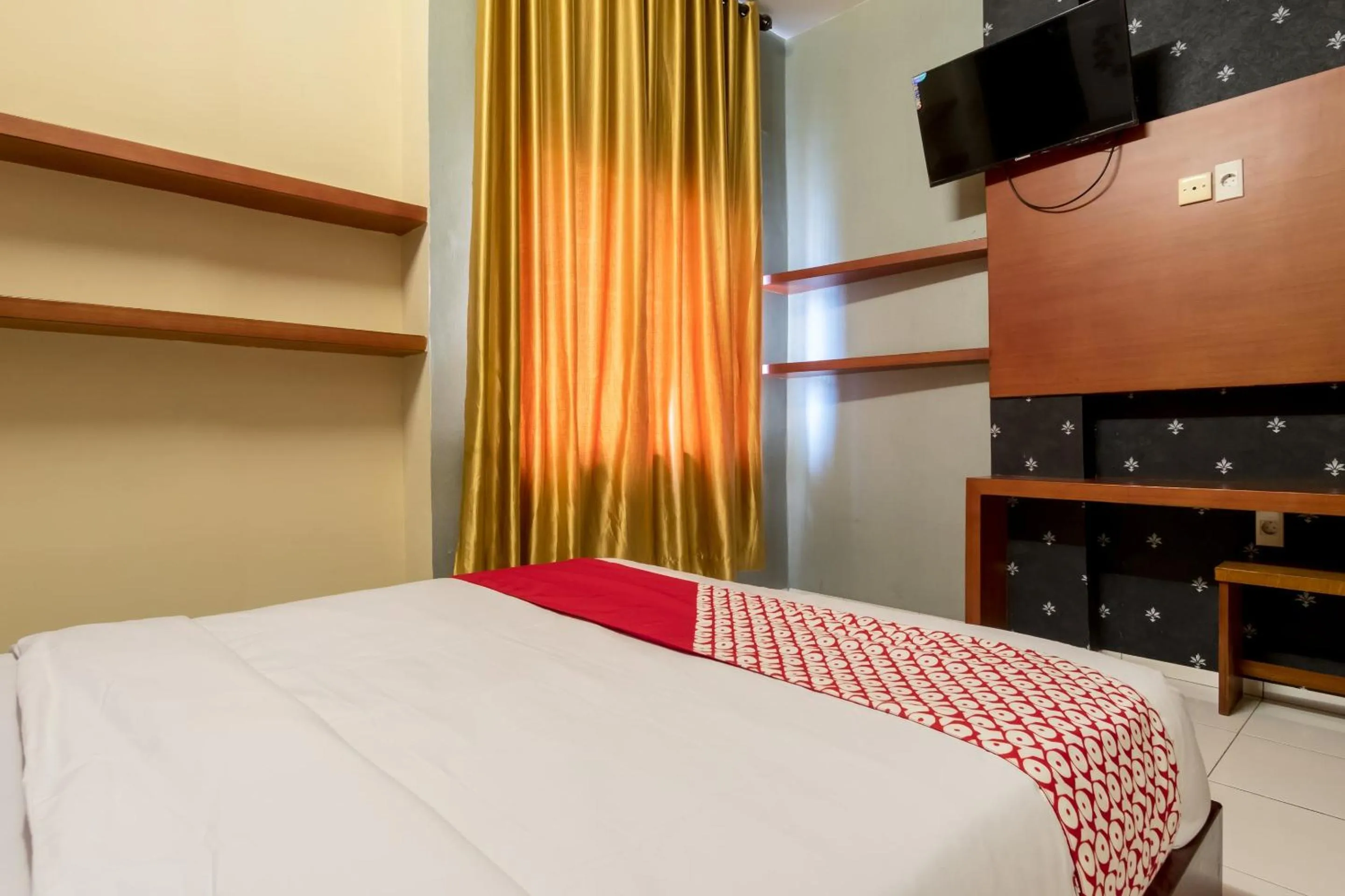 Bedroom in Capital O 615 Residence Puri Hotel Syariah