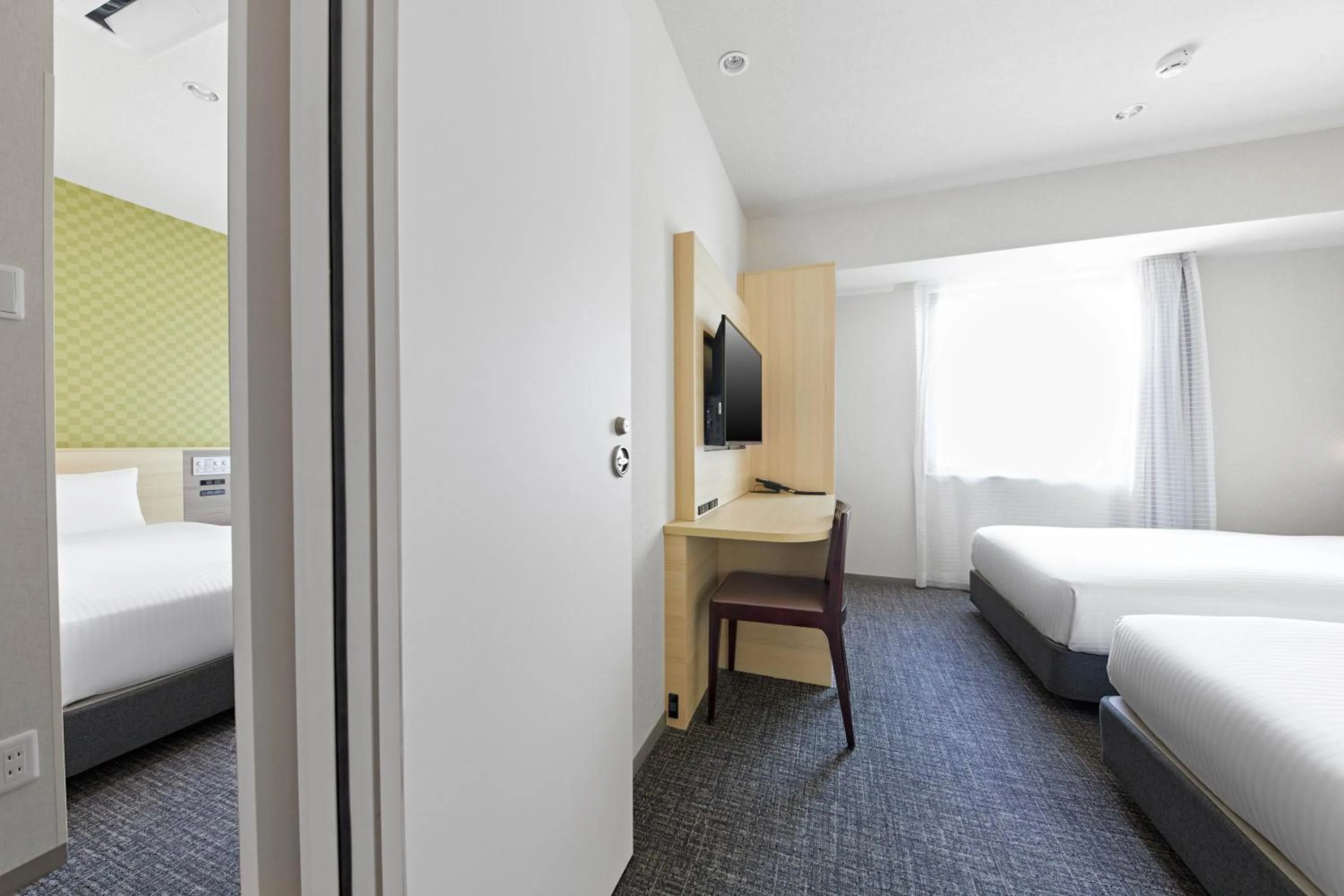 Bed in Sotetsu Fresa Inn Osaka Namba