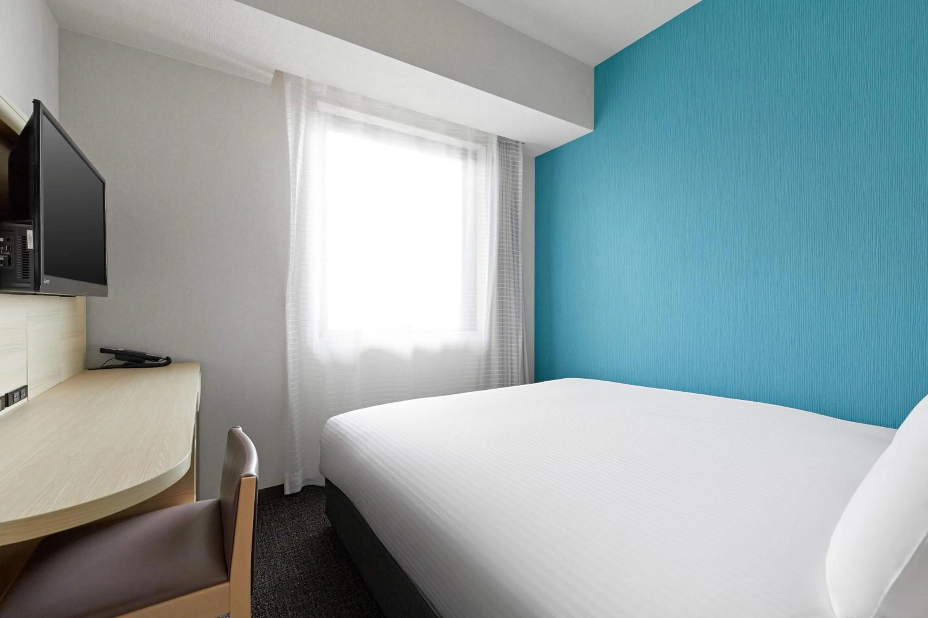 Bed in Sotetsu Fresa Inn Osaka Namba