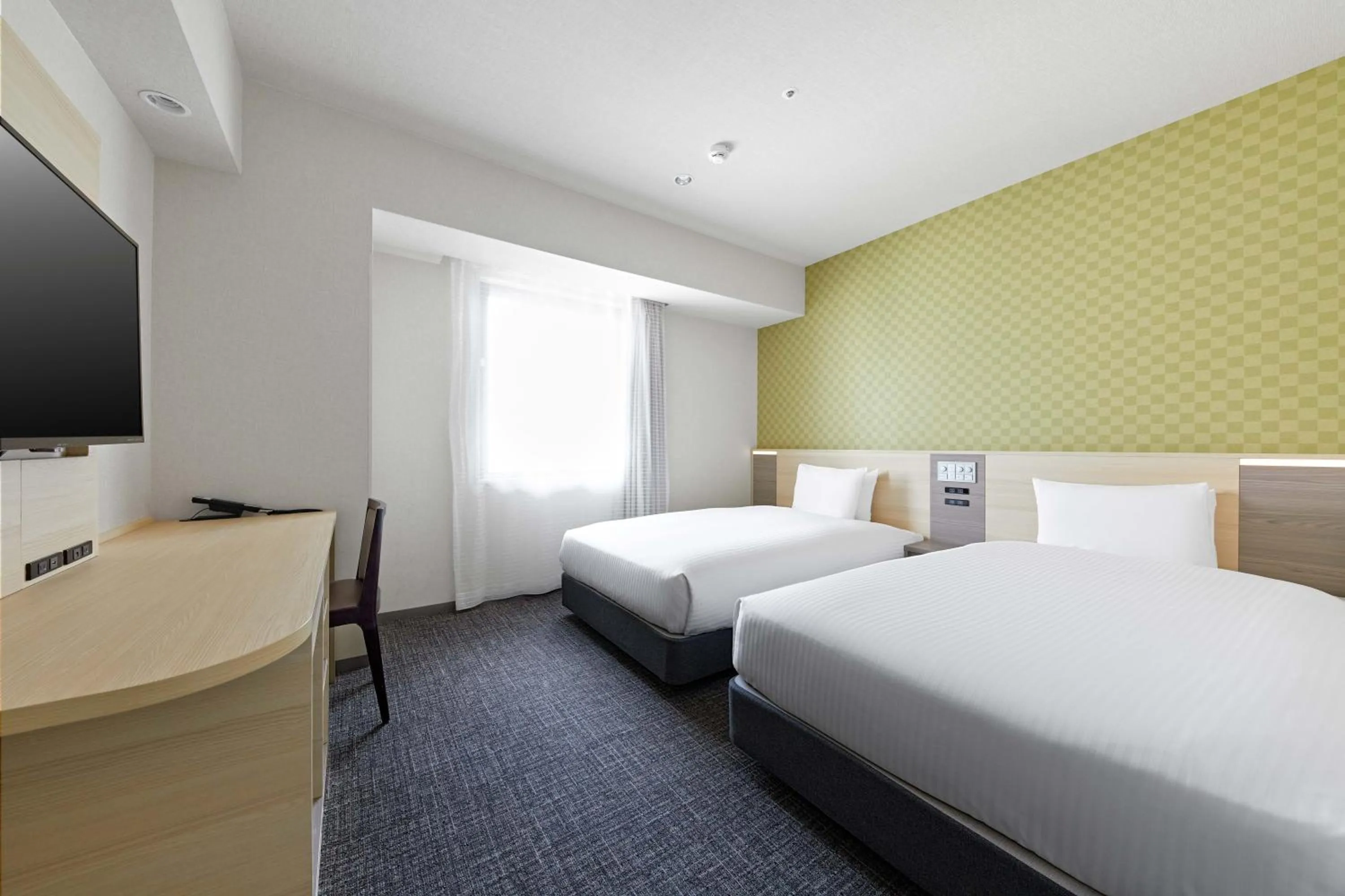 Bed in Sotetsu Fresa Inn Osaka Namba