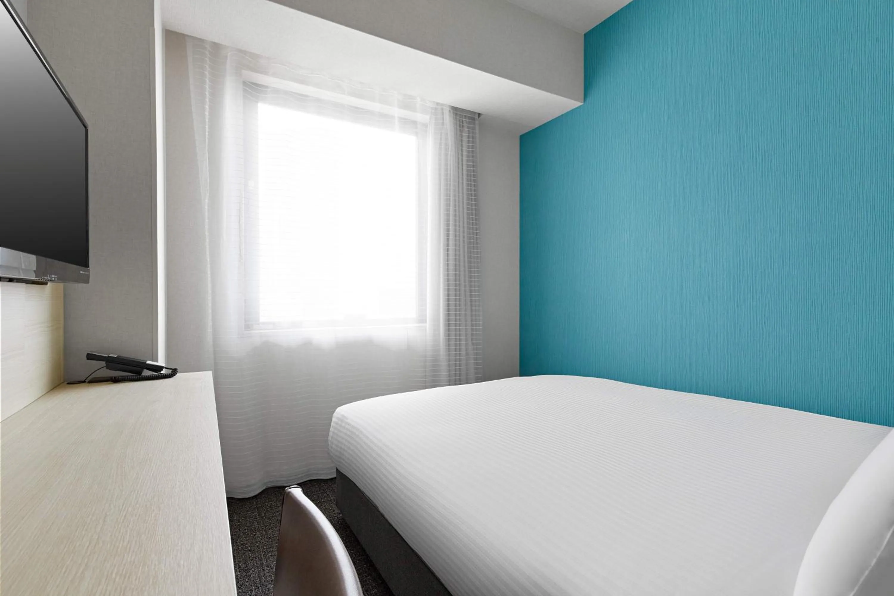 Bed in Sotetsu Fresa Inn Osaka Namba