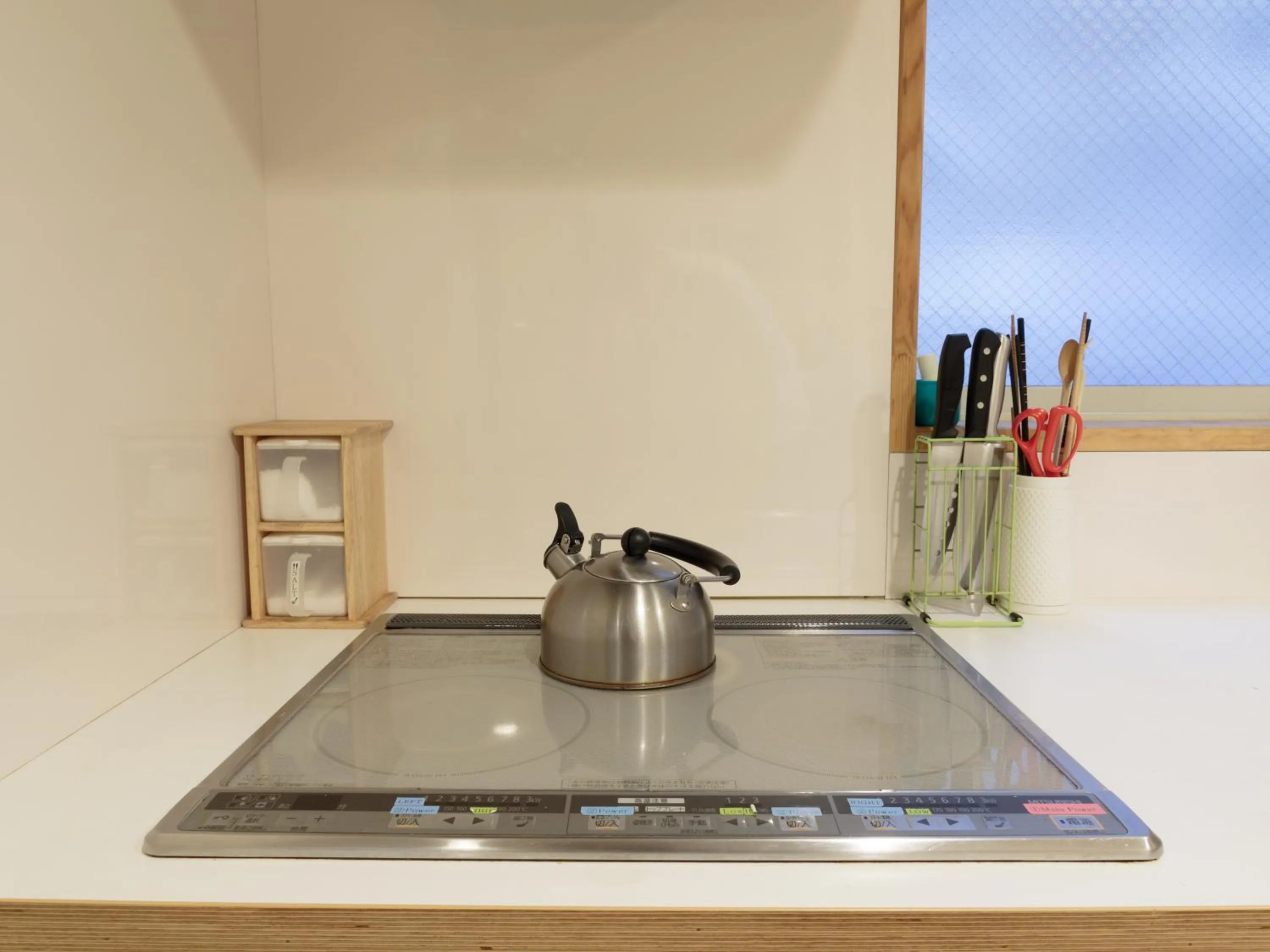 Communal kitchen in Fukuoka Hana Hostel