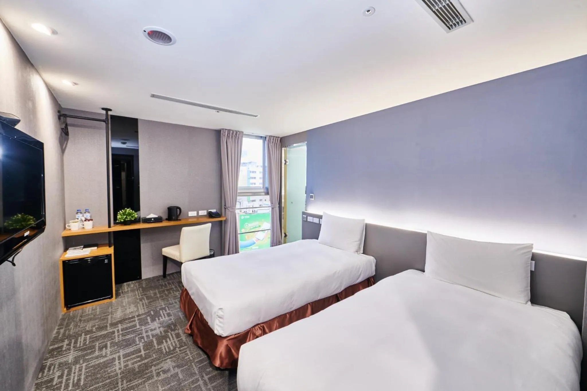 Photo of the whole room, Bed in Hotel Leisure 台中輕行旅