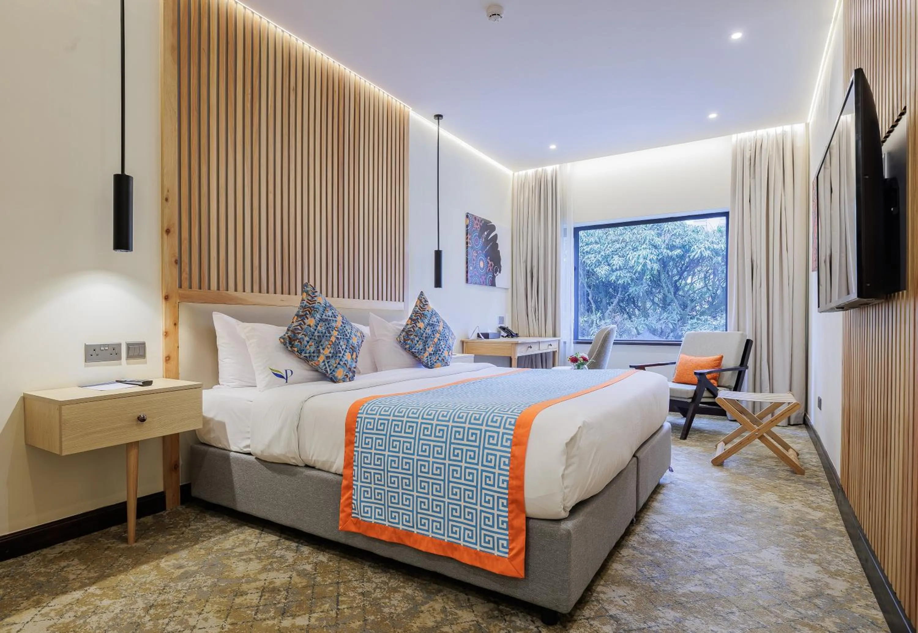 Bed in PrideInn Westlands Luxury Boutique Hotel