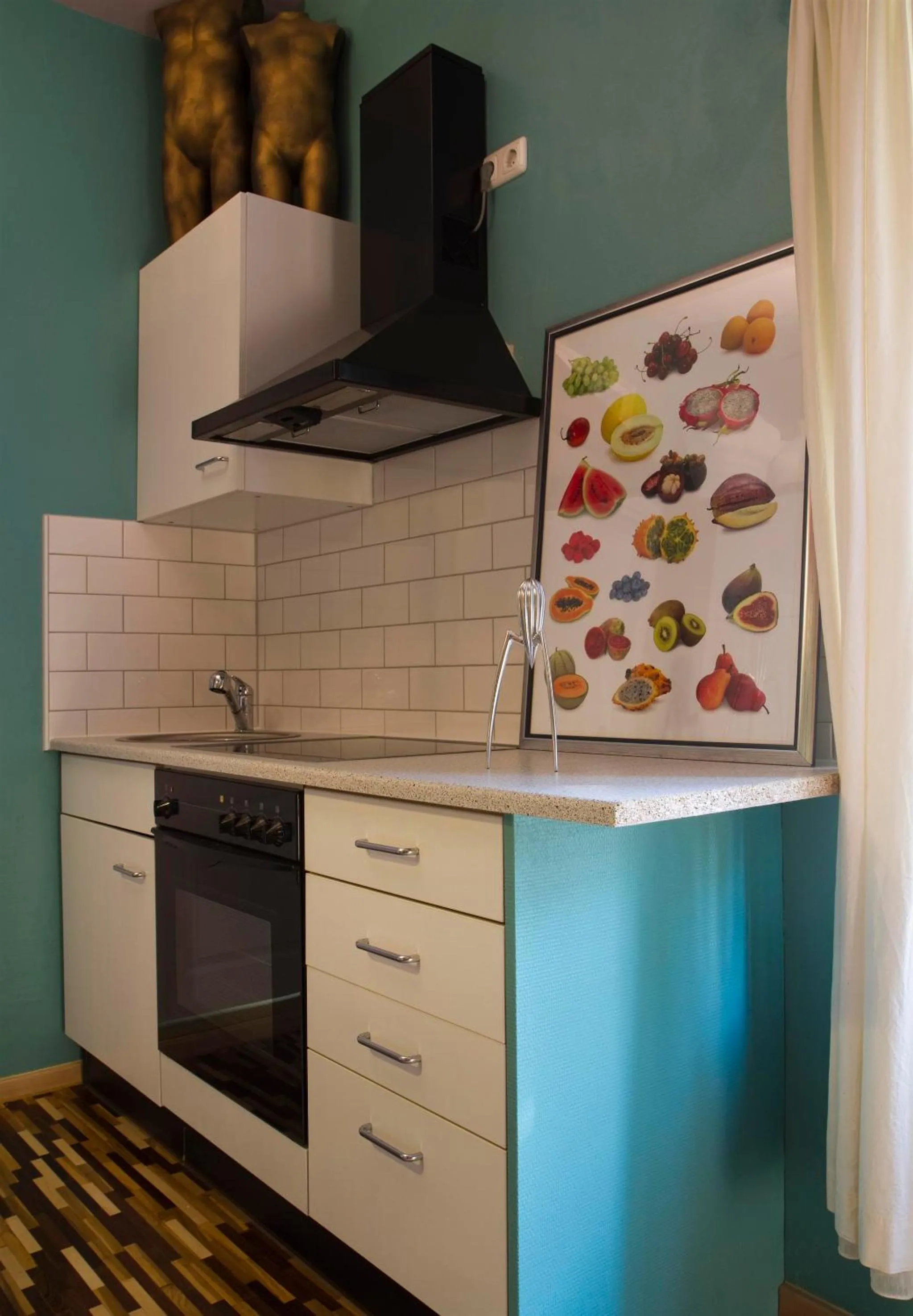 Kitchen or kitchenette in Art Apartments