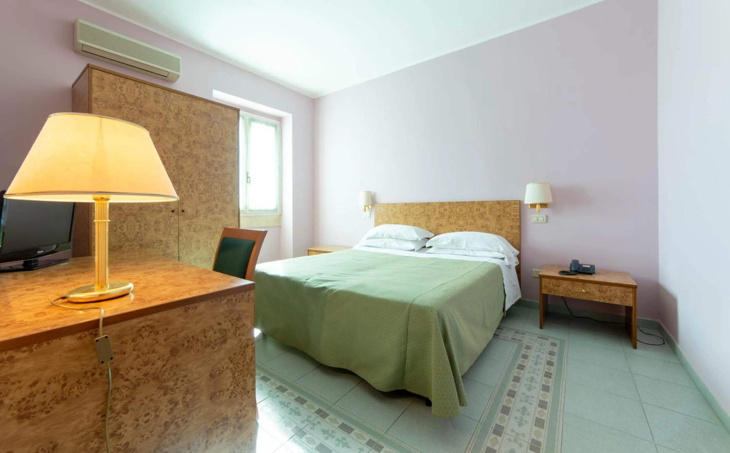 Bed in Antica Masseria Li Sauli