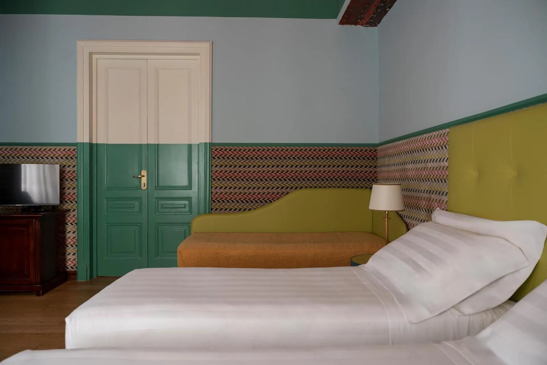 Bed in Hotel Oceania