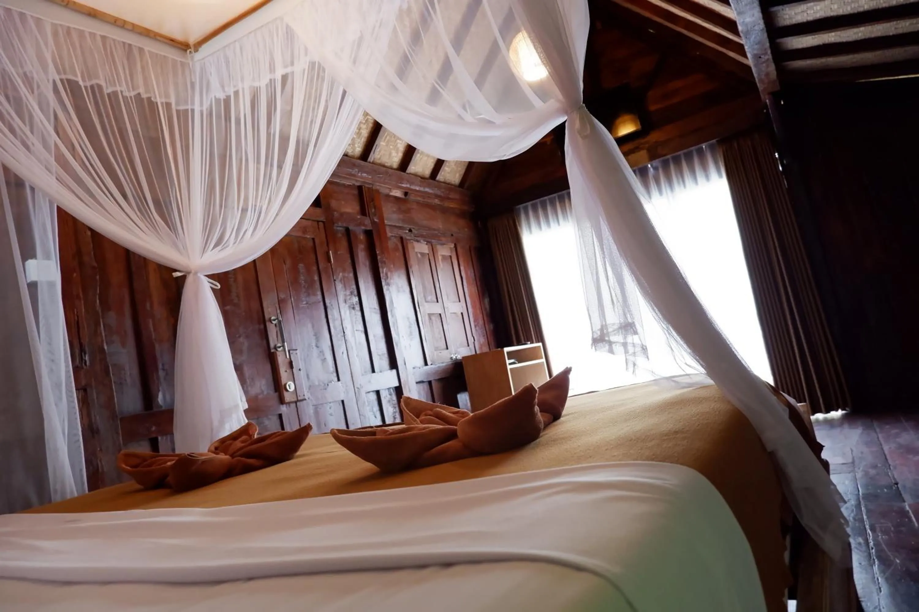 Bed in Kubudiuma Villas Bali